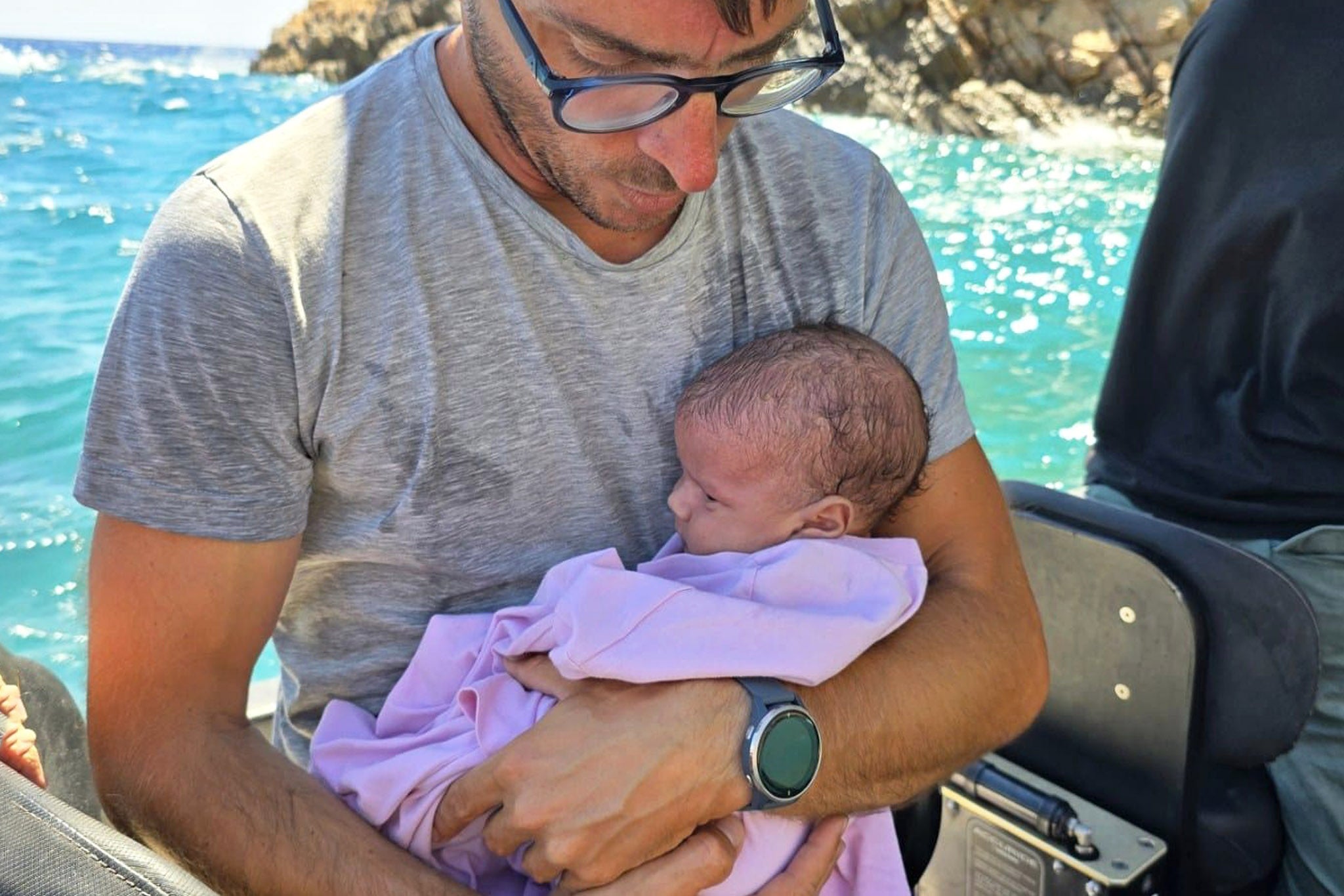 The baby was rescued on a tiny inflatable boat