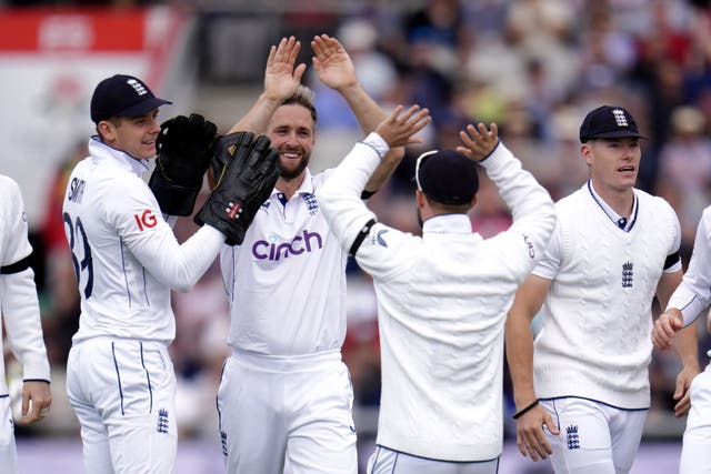 England’s Chris Woakes celebrates taking the wicket of Sri Lanka’s Nishan Madushka (Nick Potts/PA)