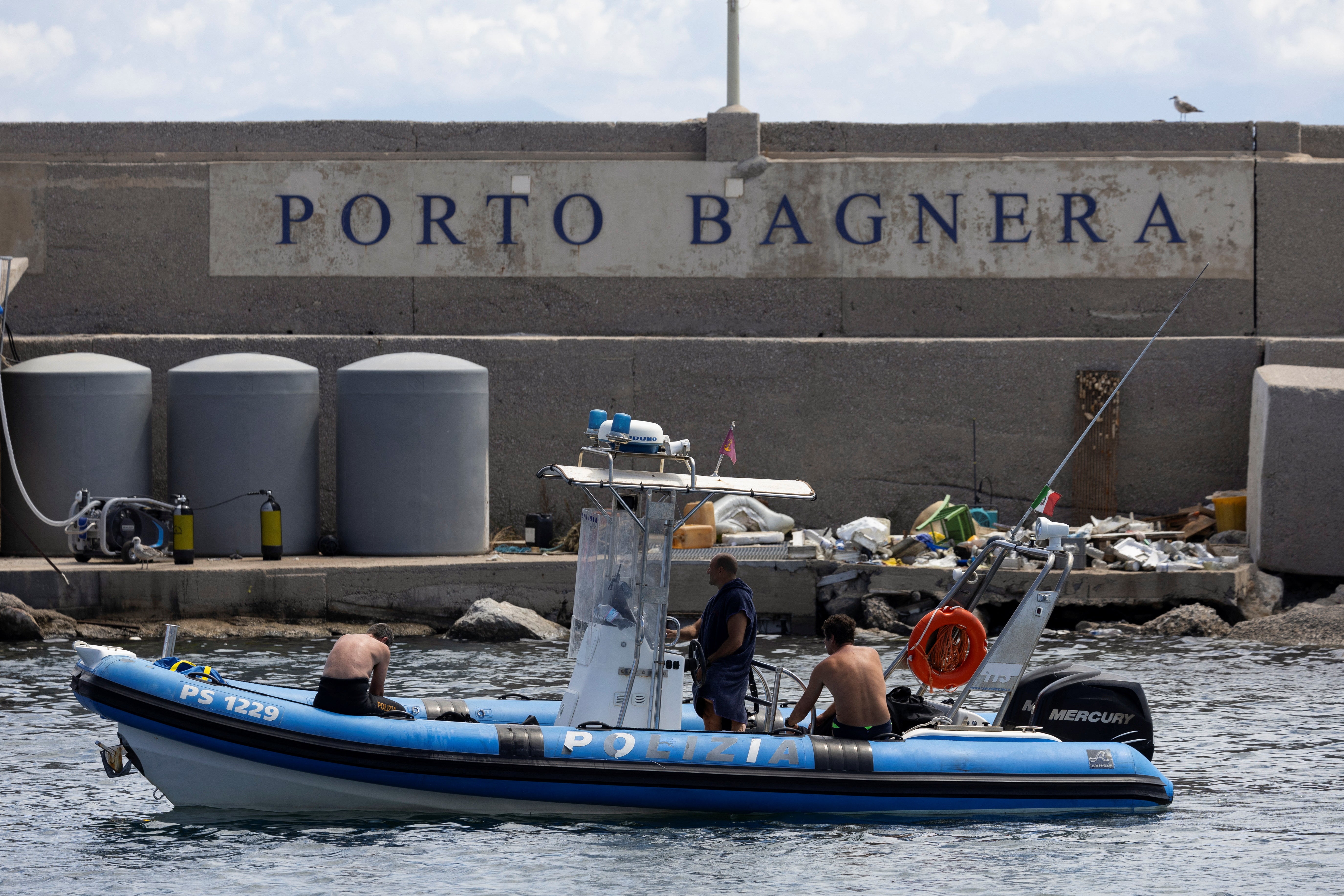 Rescue personnel at the nearby port before