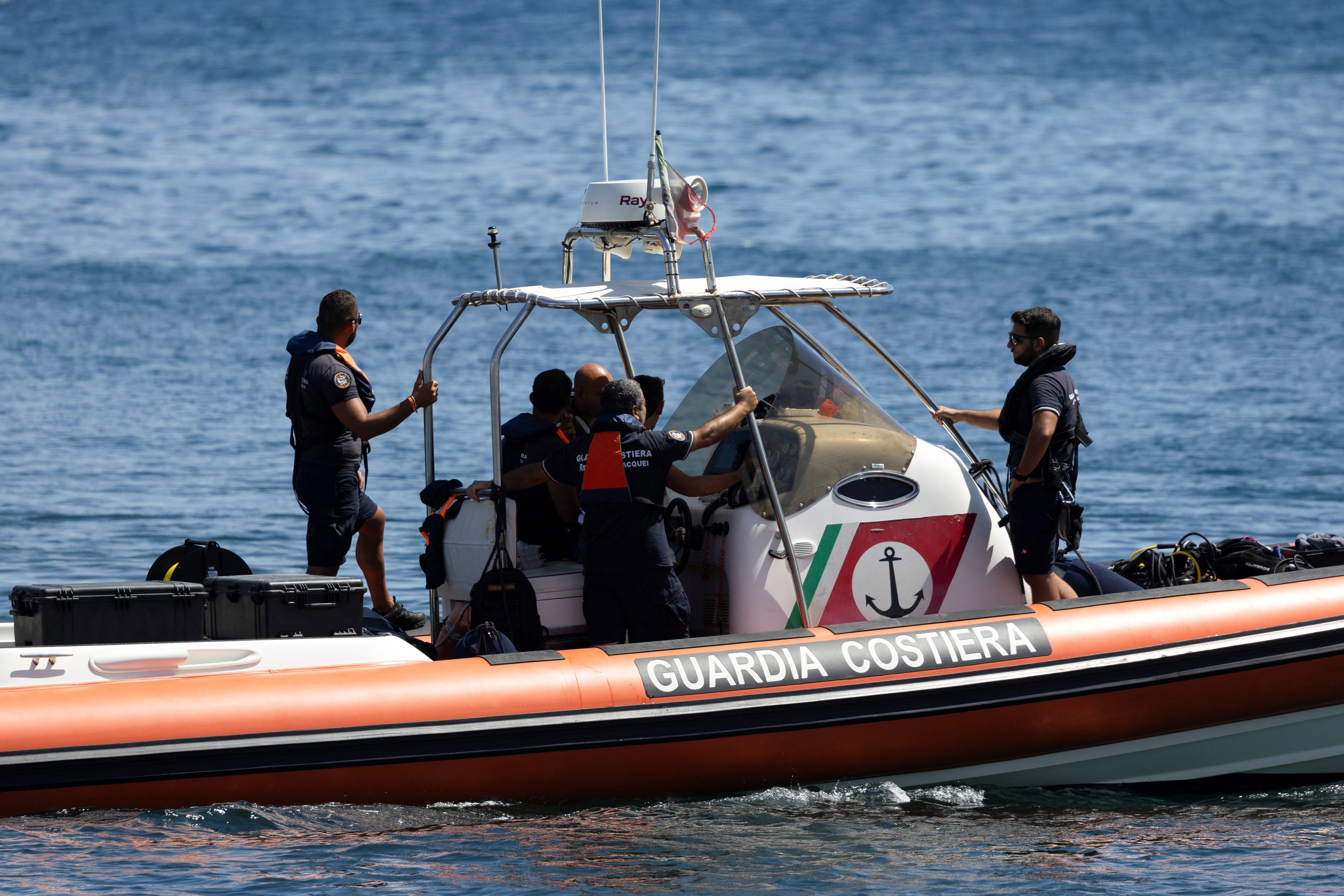 Rescue workers and divers at the scene