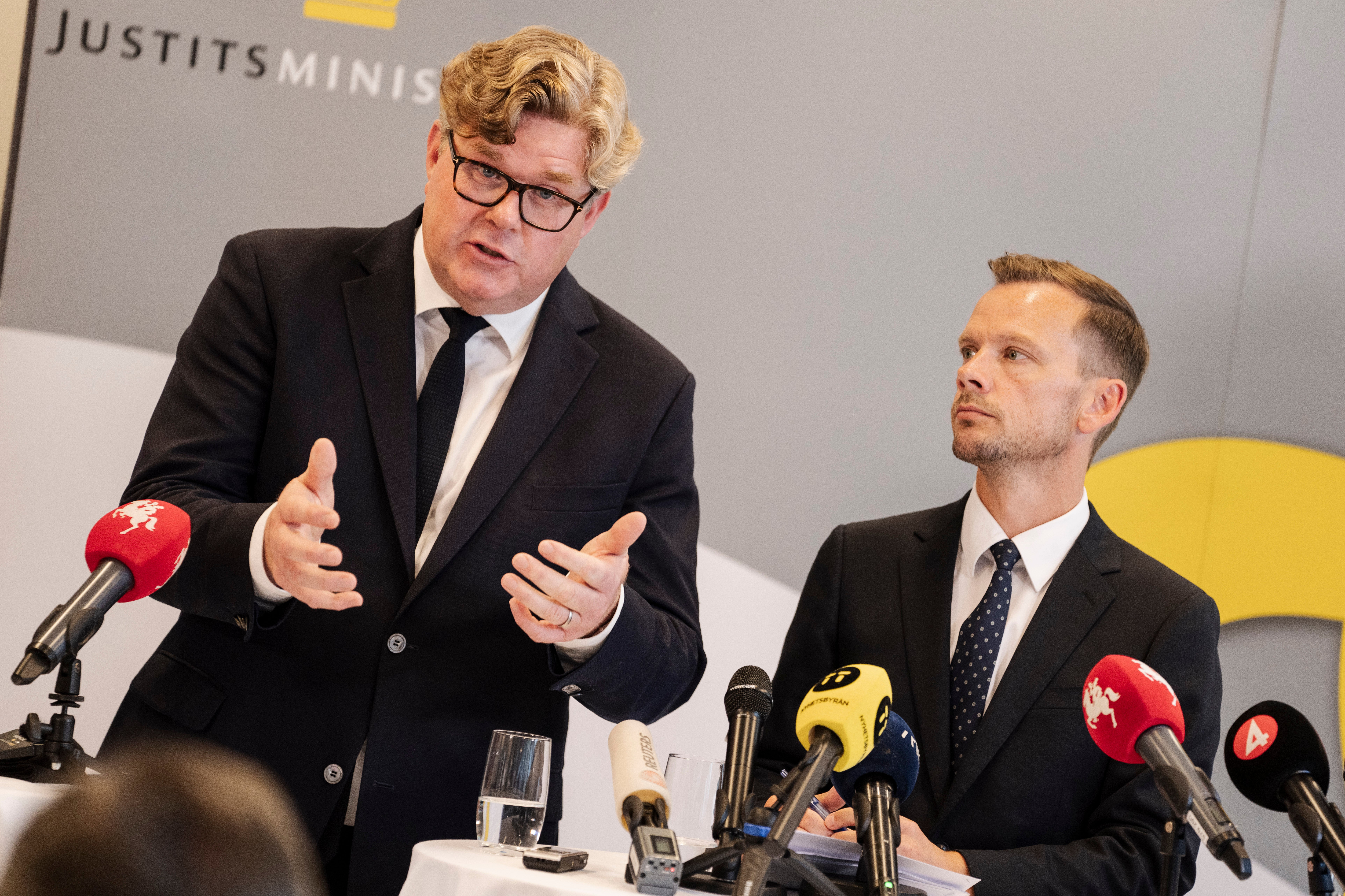 Sweden's Justice Minister Gunnar Strömmer, left, and Denmark's Justice Minister Peter Hummelgaard provide information at a press conference in the Ministry of Justice in Copenhagen, Wednesday, Aug. 21, 2024, about the effort against gang crime