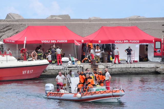 The fire service dive team leaves port heading for the dive site (Jonathan Brady/PA)