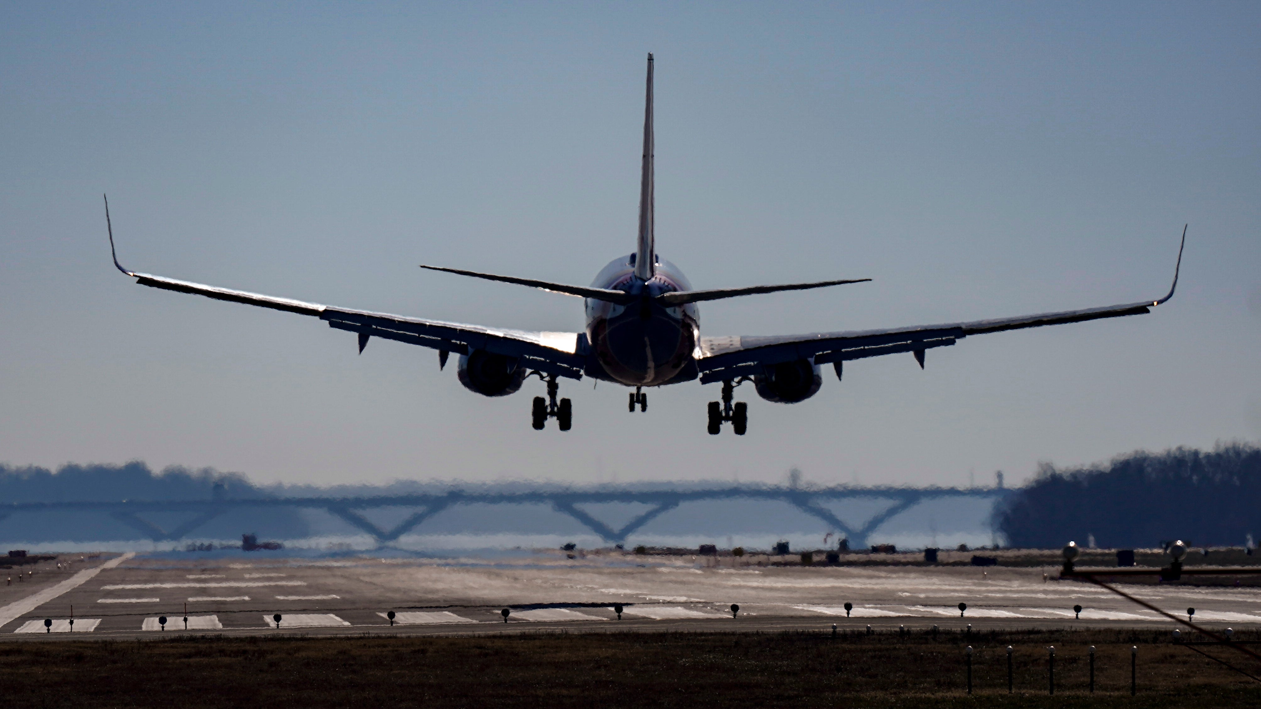 A Southwest plane lands at Ronald Reagan Washington National Airport in Arlington