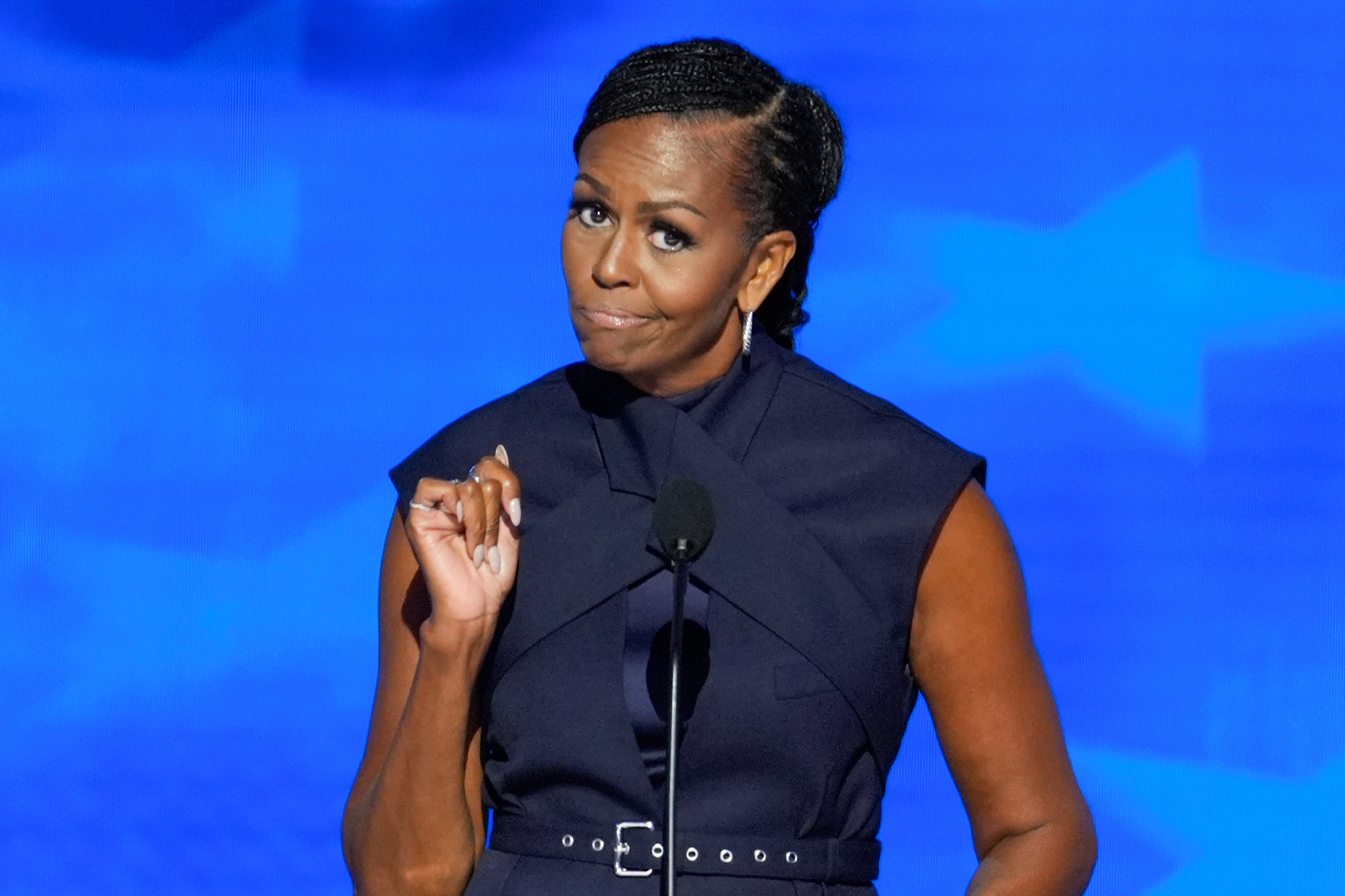 There were ‘undeniable’ similarities to the speech Michelle Obama gave in 2008. Michelle Obama pictured at this year’s DNC in Chicago