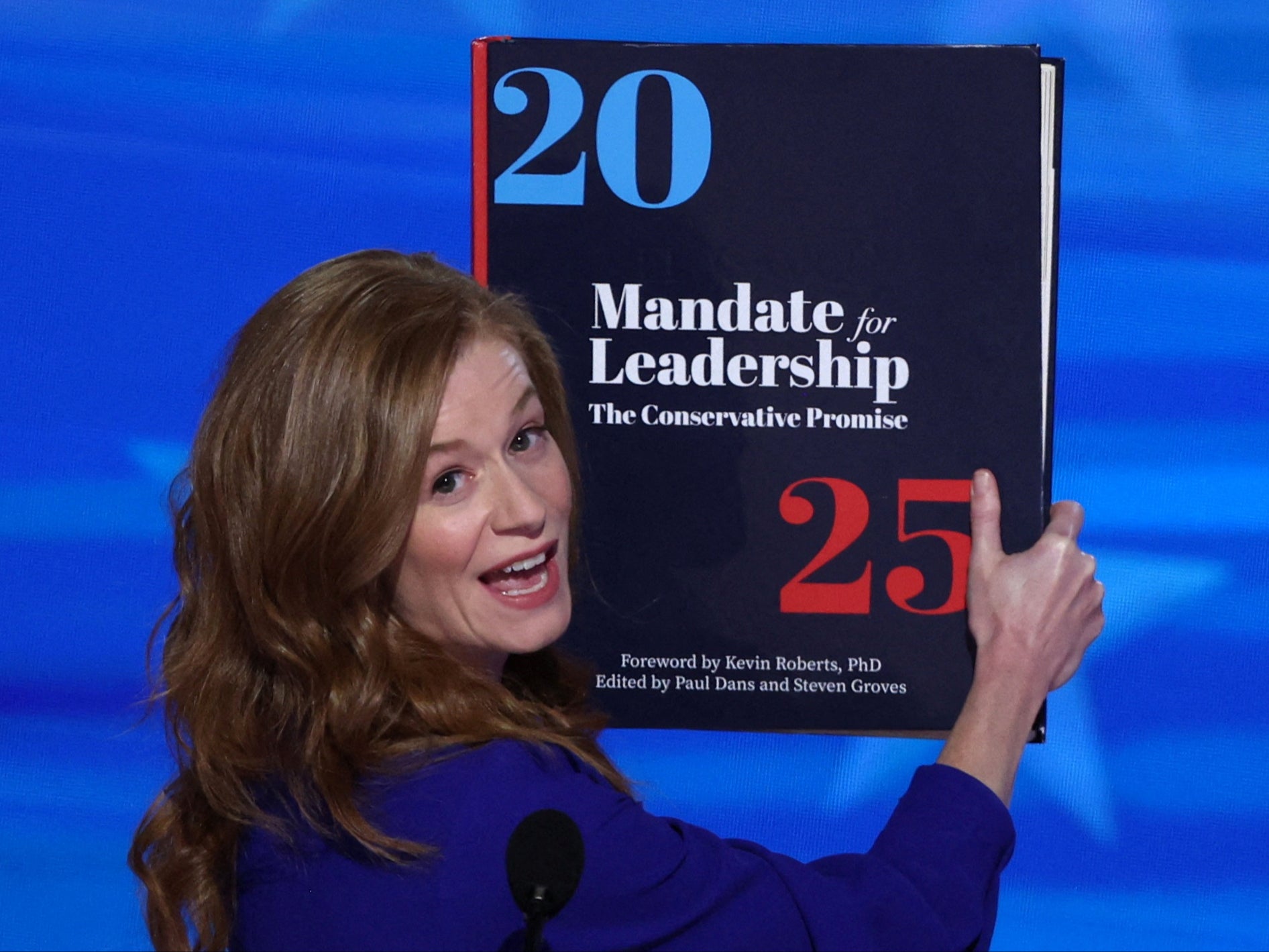 Michigan Senator Mallory McMorrow holds up a copy of Project 25 at the Democratic National Convention in Chicago, Illinois, on August 19 2024