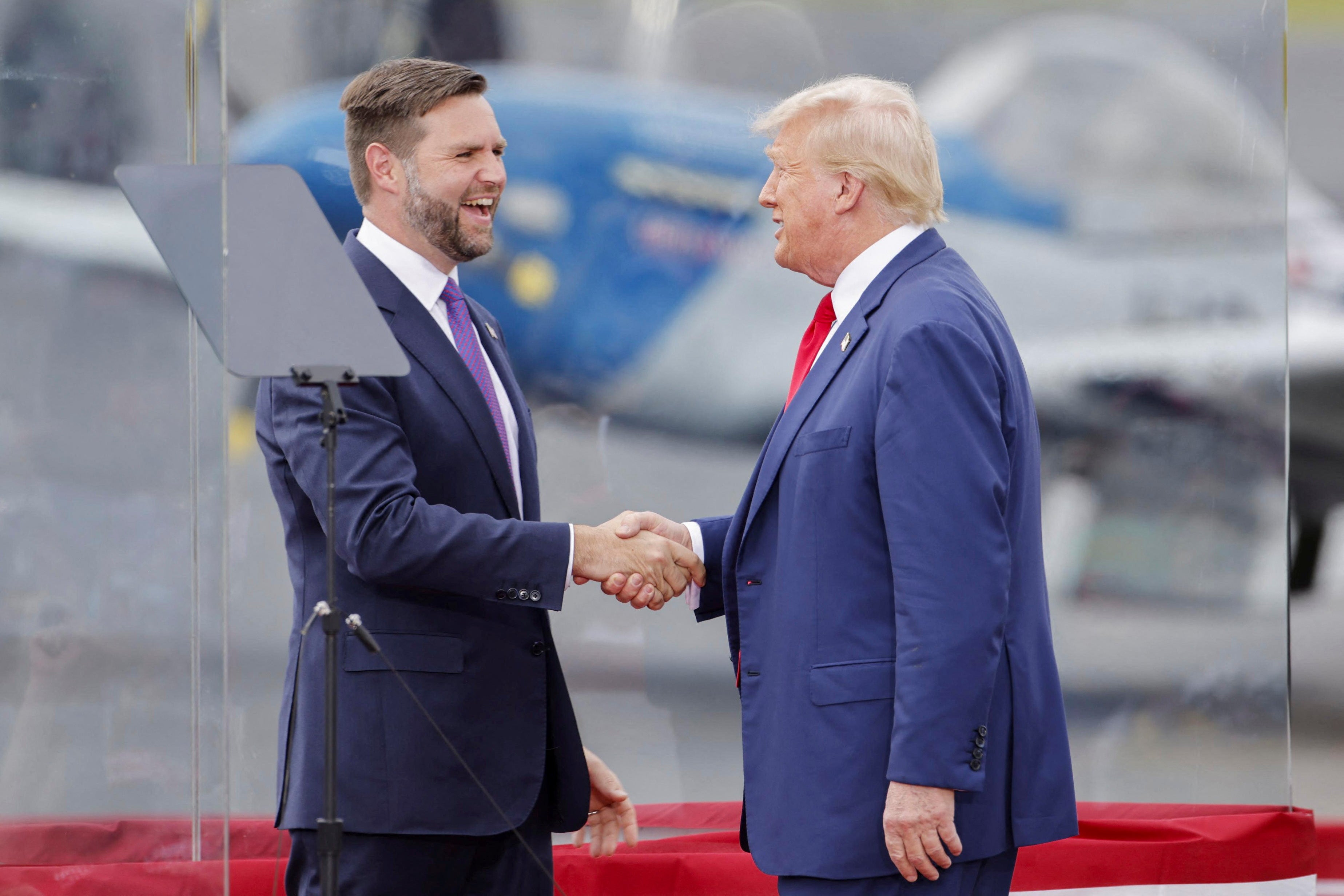 Donald Trump and JD Vance shake hands during a campaign rally in Asheboro, North Carolina on August 21. The former president is set to visit Nevada and Arizona later this week