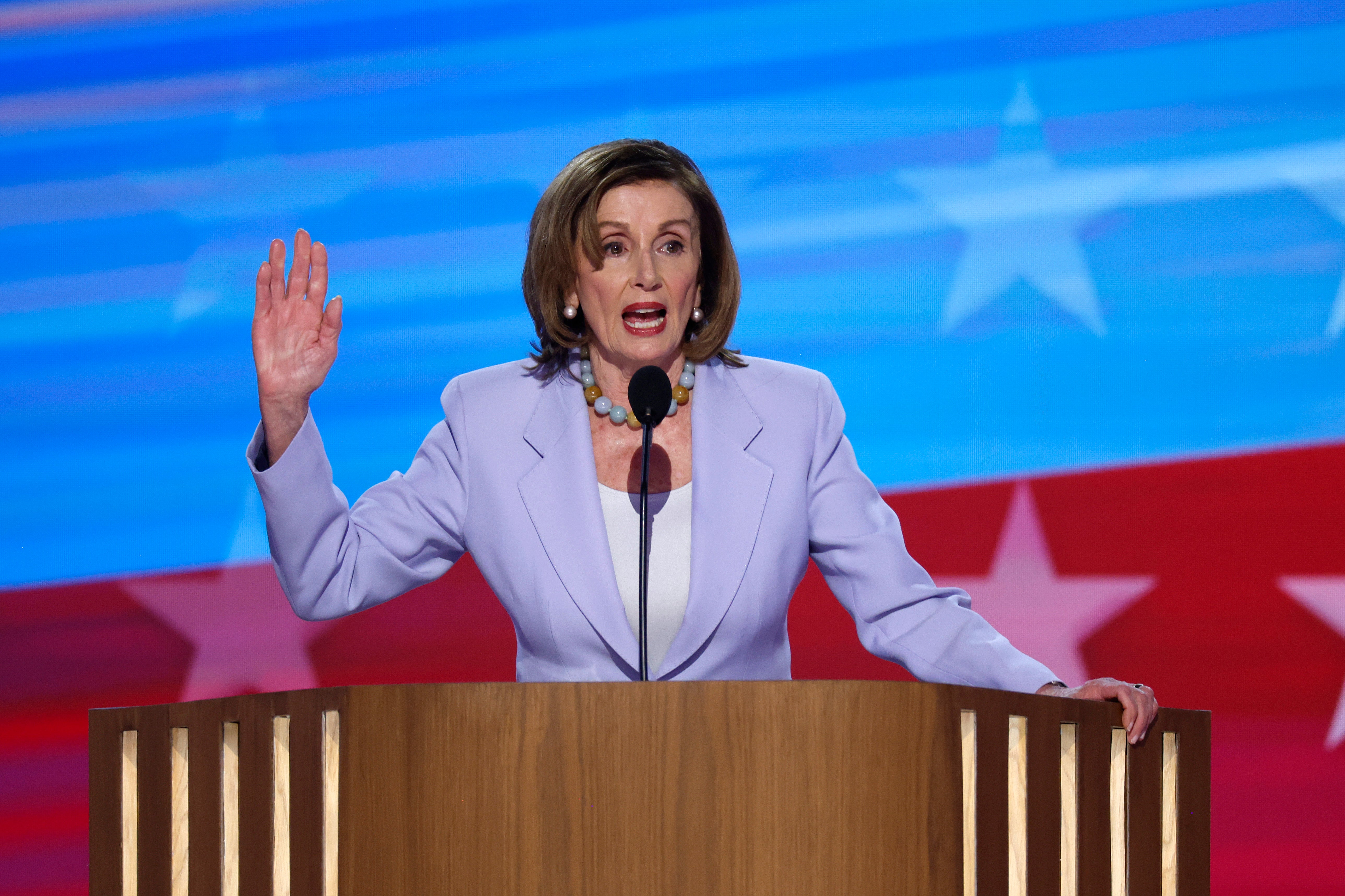 Former House Speaker Rep. Nancy Pelosi (D-CA) speaks on stage during the third day of the Democratic National Convention at the United Center. But she did not mention her push to remove President Joe Biden off the top of the ticket.