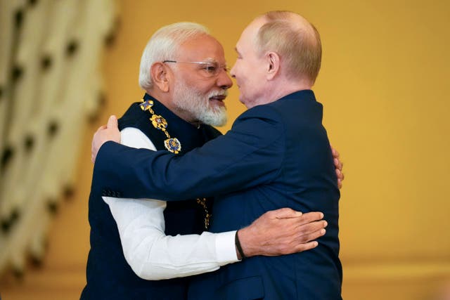 <p>Russian president Vladimir Putin, right, awards Indian prime minister Narendra Modi with the Order of St. Andrew the Apostle the First-Called at the Kremlin</p>