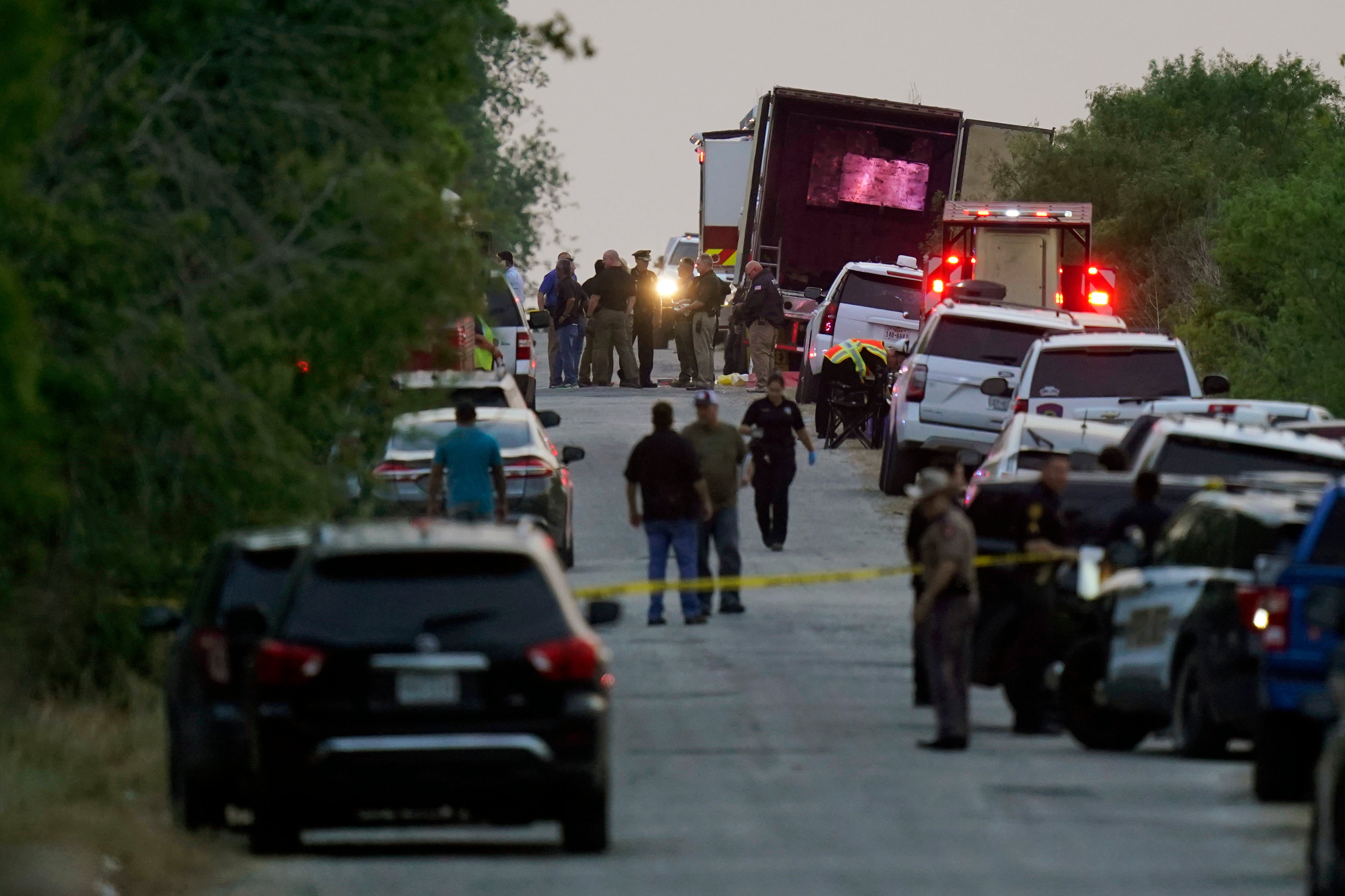 First responders found dead bodies stacked up in the sweltering trailer, according to authorities.