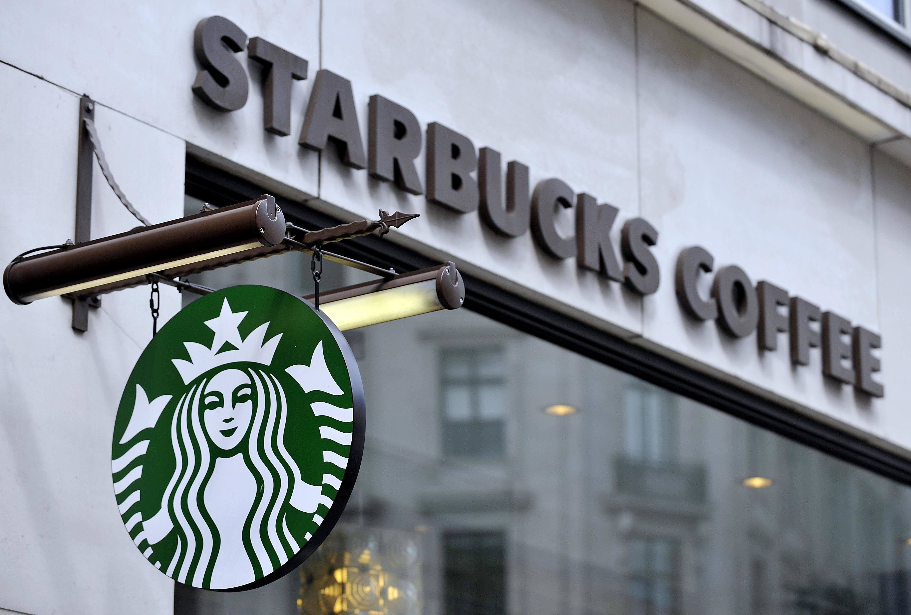 Starbucks shares jumped more than 20 per cent after the coffee shop giant announced it was replacing its chief executive