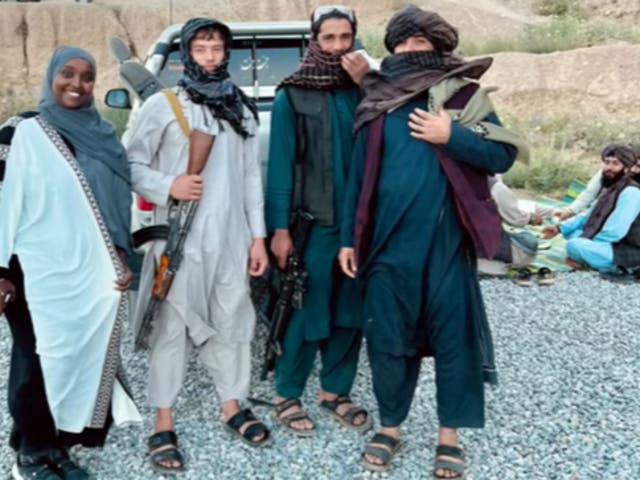 <p>TikTok influencer Marian Abdi ‘Geenyada’ posing with Taliban fighters in Afghanistan</p>