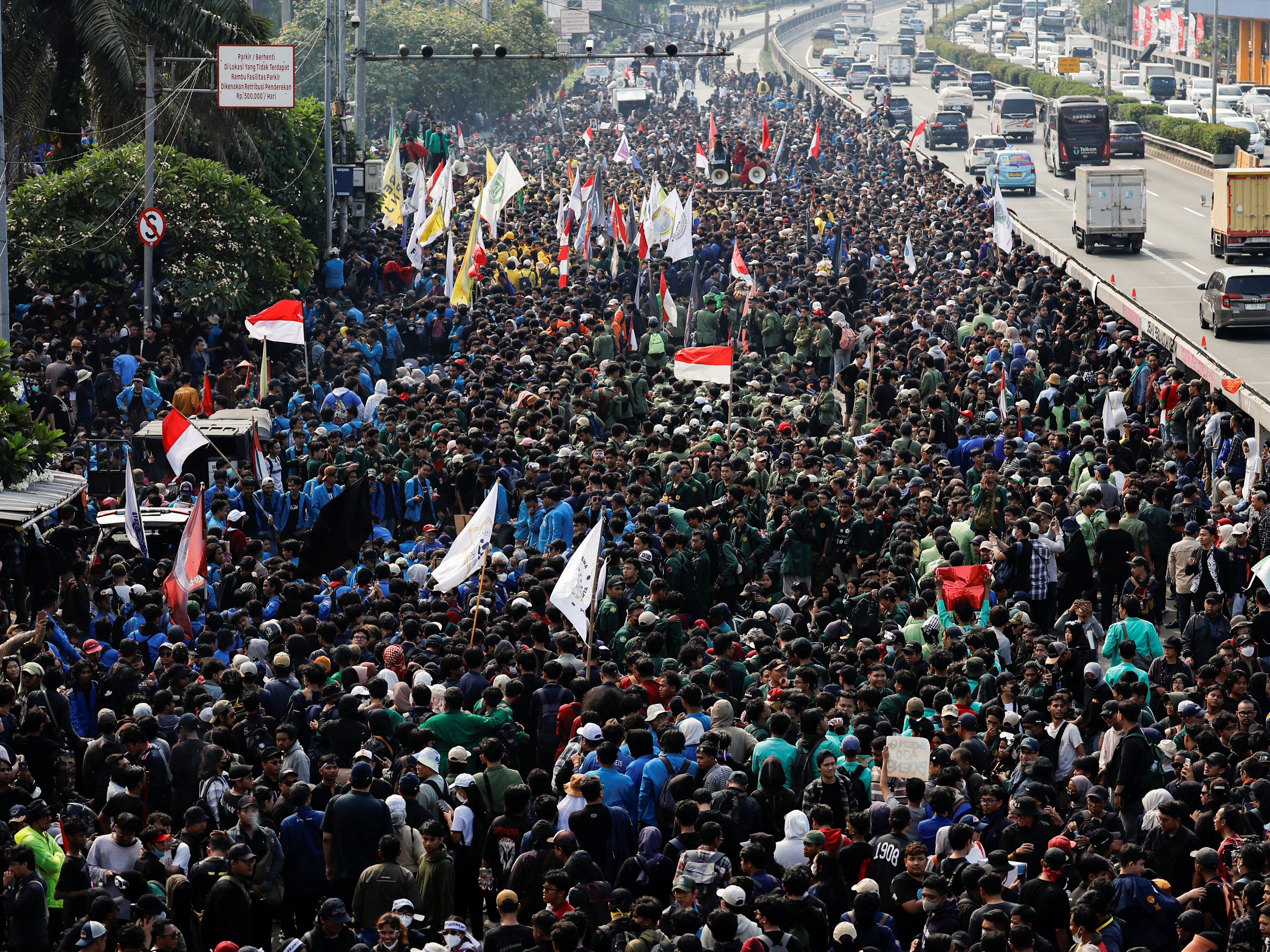 Indonesians protest against controversial changes to the election law outside the parliament building in Jakarta on 22 August 2024