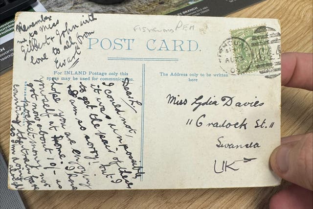 A 121-year-old postcard which looks as though it ‘should be in a museum’ has been delivered more than a century after it was sent (Henry Darby/PA)