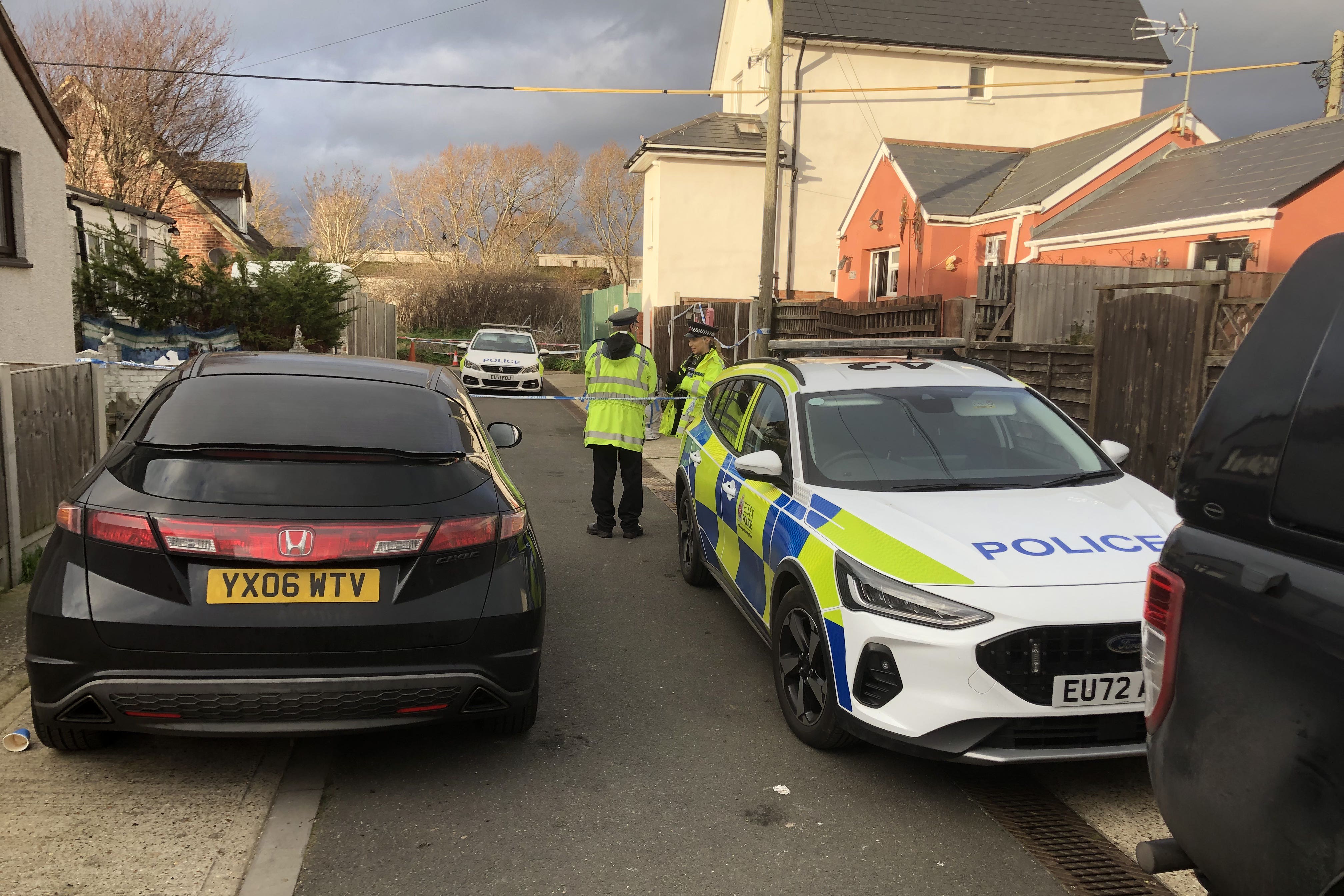 The police cordon in Hillman Avenue, Jaywick, Essex, after a 68-year-old grandmother was savaged to death by two dogs (Gwyn Wright/PA)