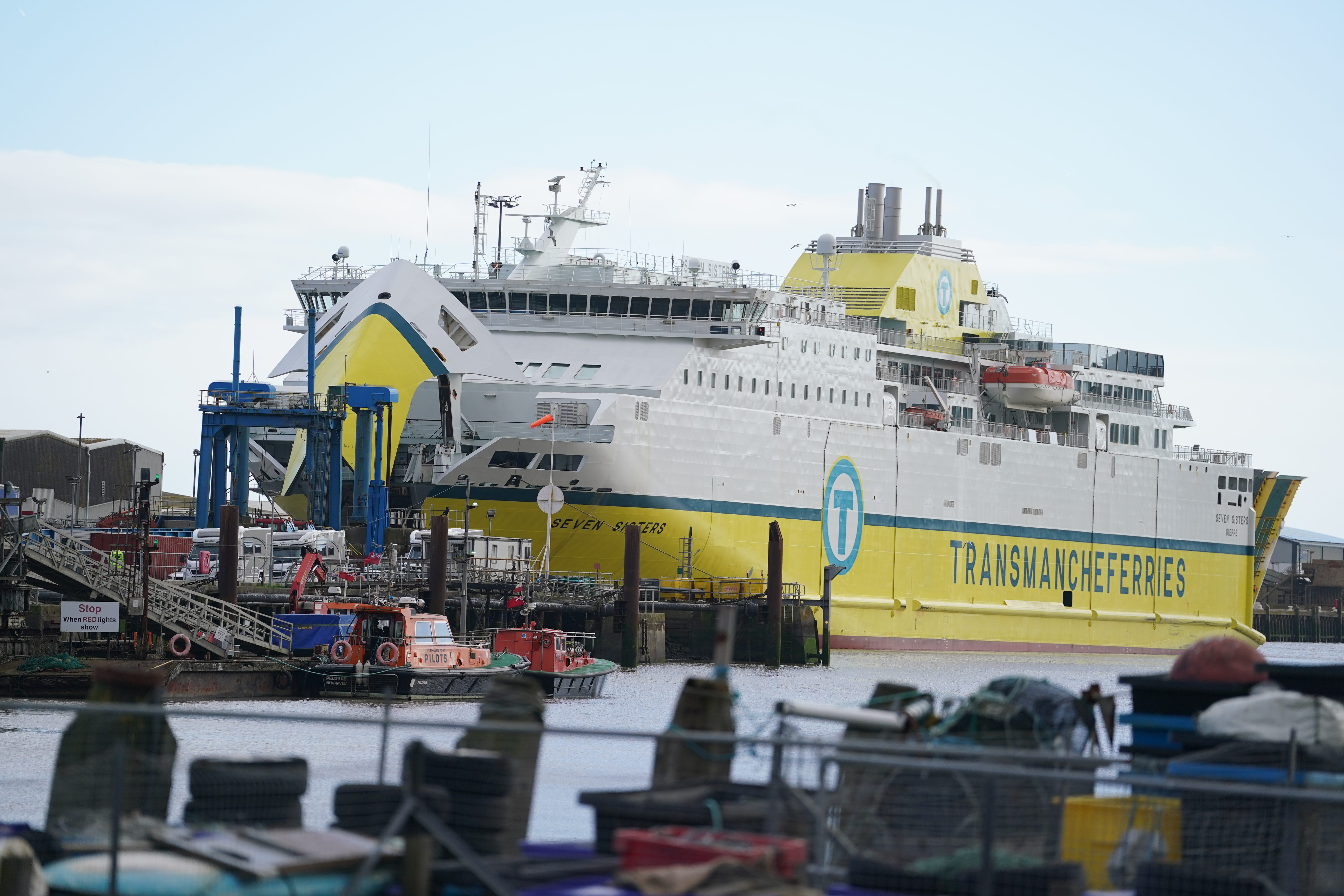 The scene at Newhaven ferry port after migrants have been found in the back of a lorry at port in East Sussex amid a large emergency services presence (PA)