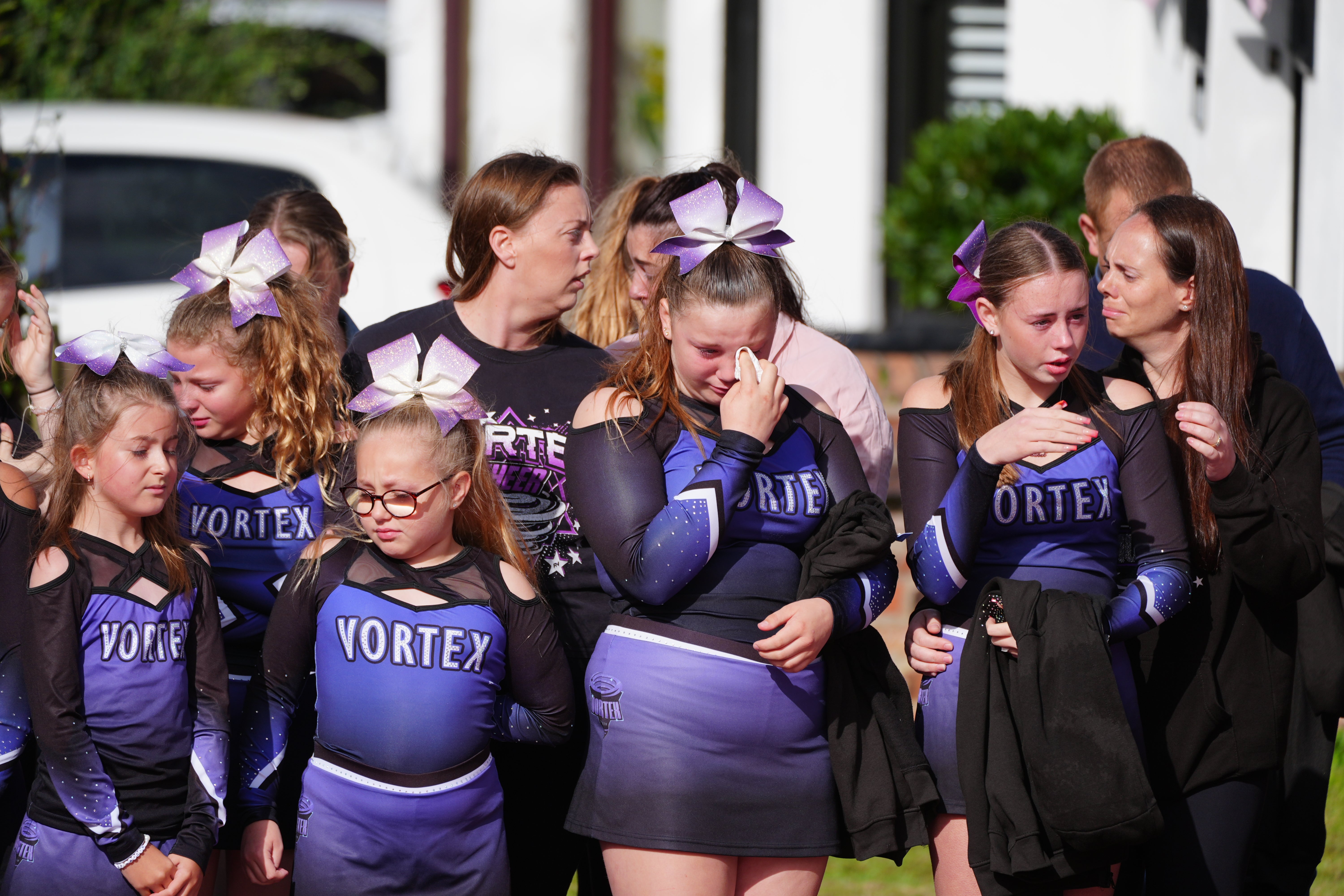 Cheerleaders arrived to pay their respects to Elsie, a fellow passionate cheerleader