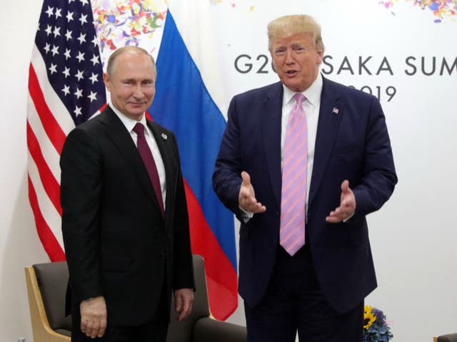 <p>Russian president Vladimir Putin Donald Trump at a G20 summit in 2019 </p>