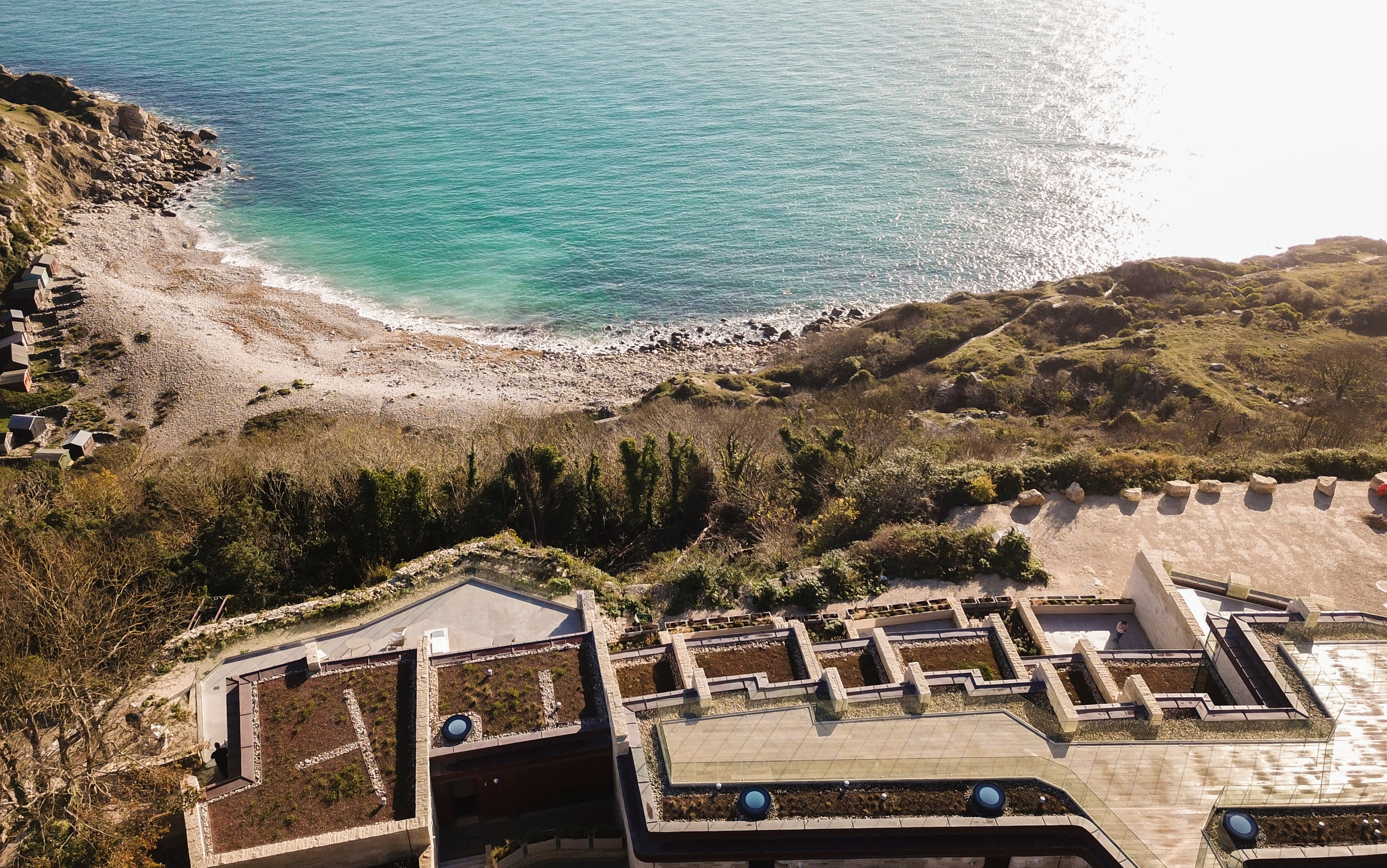 The idyllic cottages nestled in the Portland stone cliffs