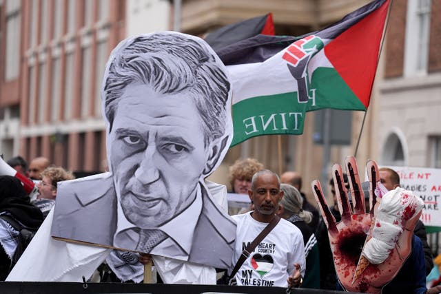 Protesters take part in a pro-Palestine protest on Kildare Street outside Leinster House, Dublin (Brian Lawless/PA)