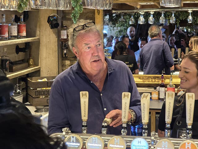 <p>Jeremy Clarkson’s behind the bar of The Farmer’s Dog (Neil Robinson/PA)</p>