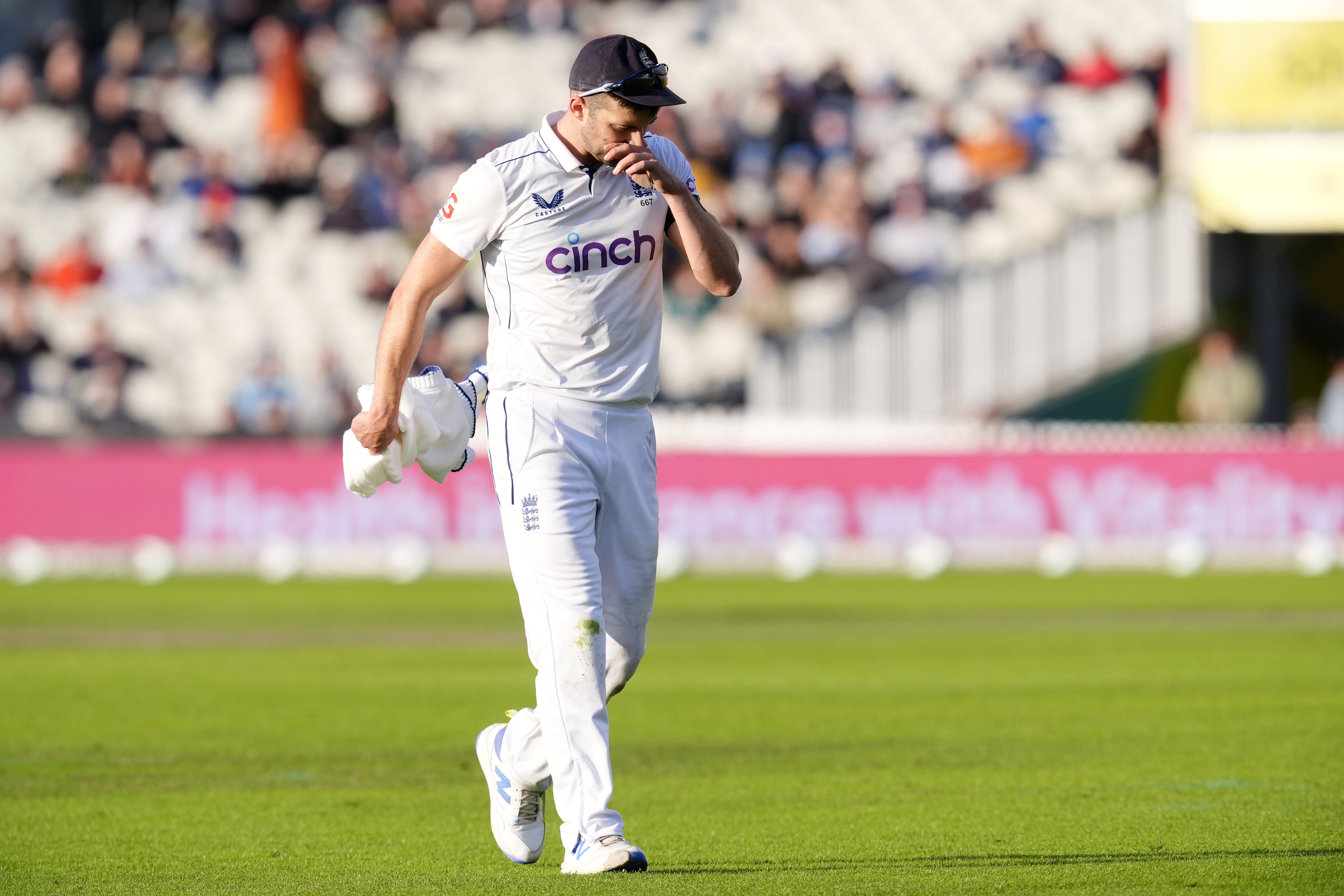 Mark Wood leaves the field after picking up an injury towards the close of day three (Nick Potts/PA)