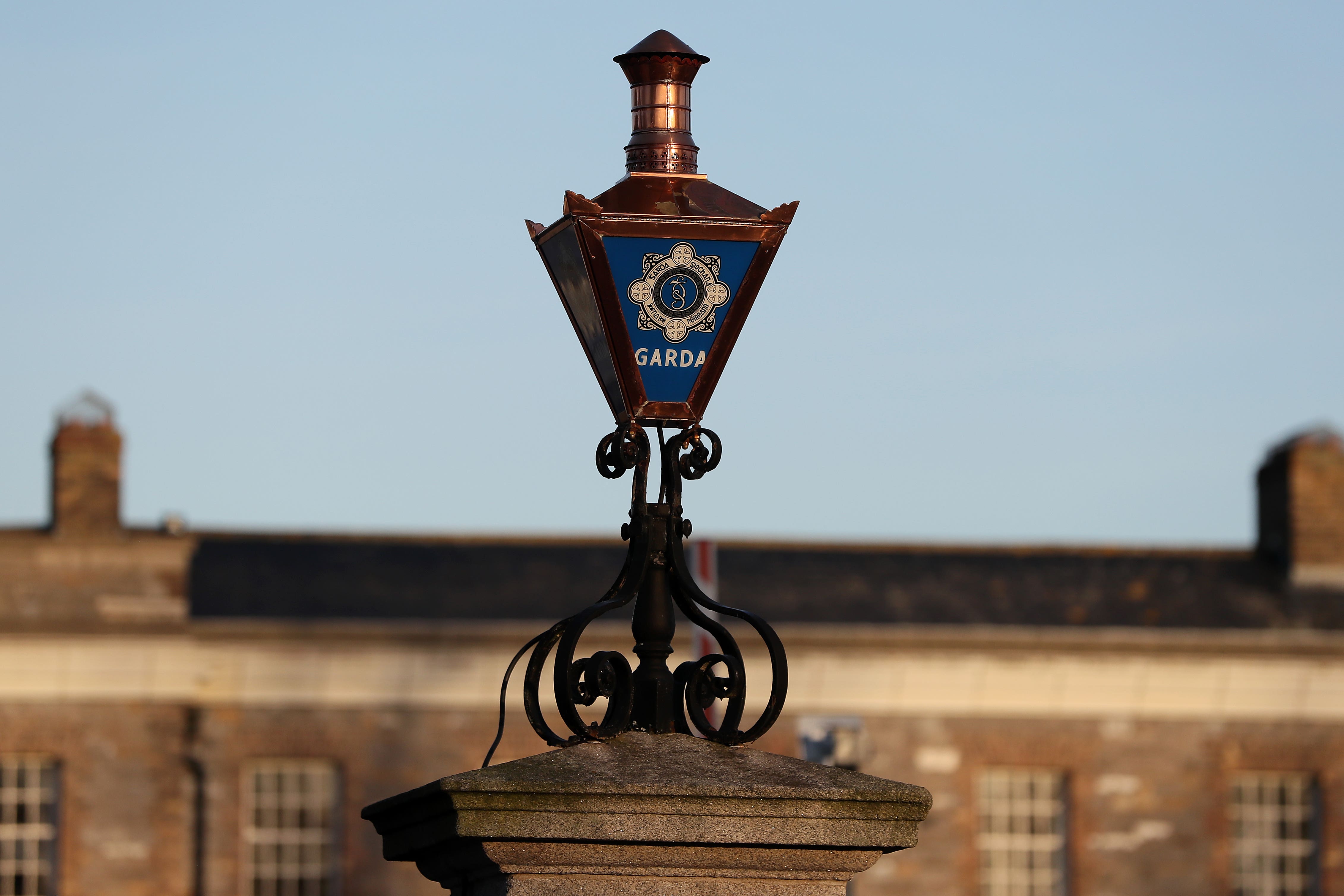 The Garda logo on a lamp at the entrance to Garda Headquarters in the Phoenix Park, Dublin (PA)