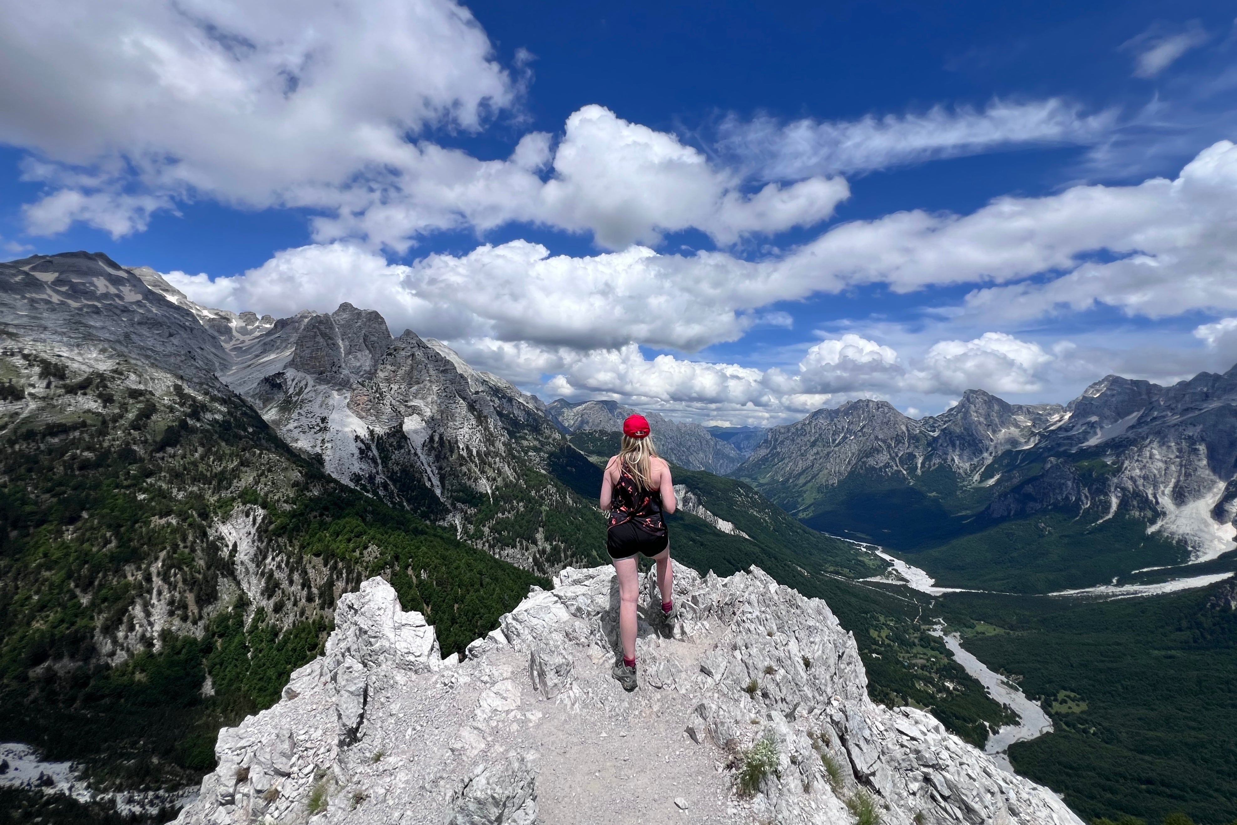 The writer reaches the top of the Valbona Pass