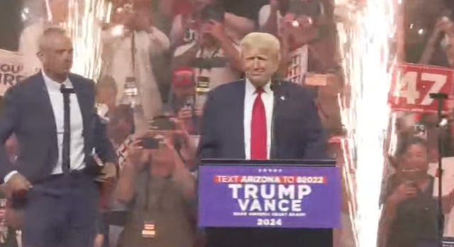 <p>Trump welcomes RFK Jr on stage at his rally in Glendale, Arizona after the Independent candidate dropped out of the presidential race and endorsed the former president</p>