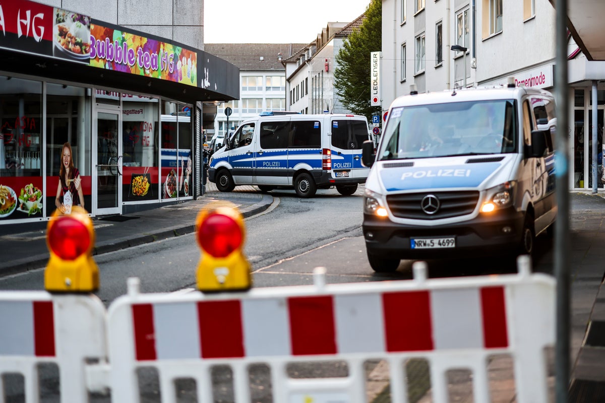 Police search for the man who killed 3 in a knife attack in the German city of Solingen