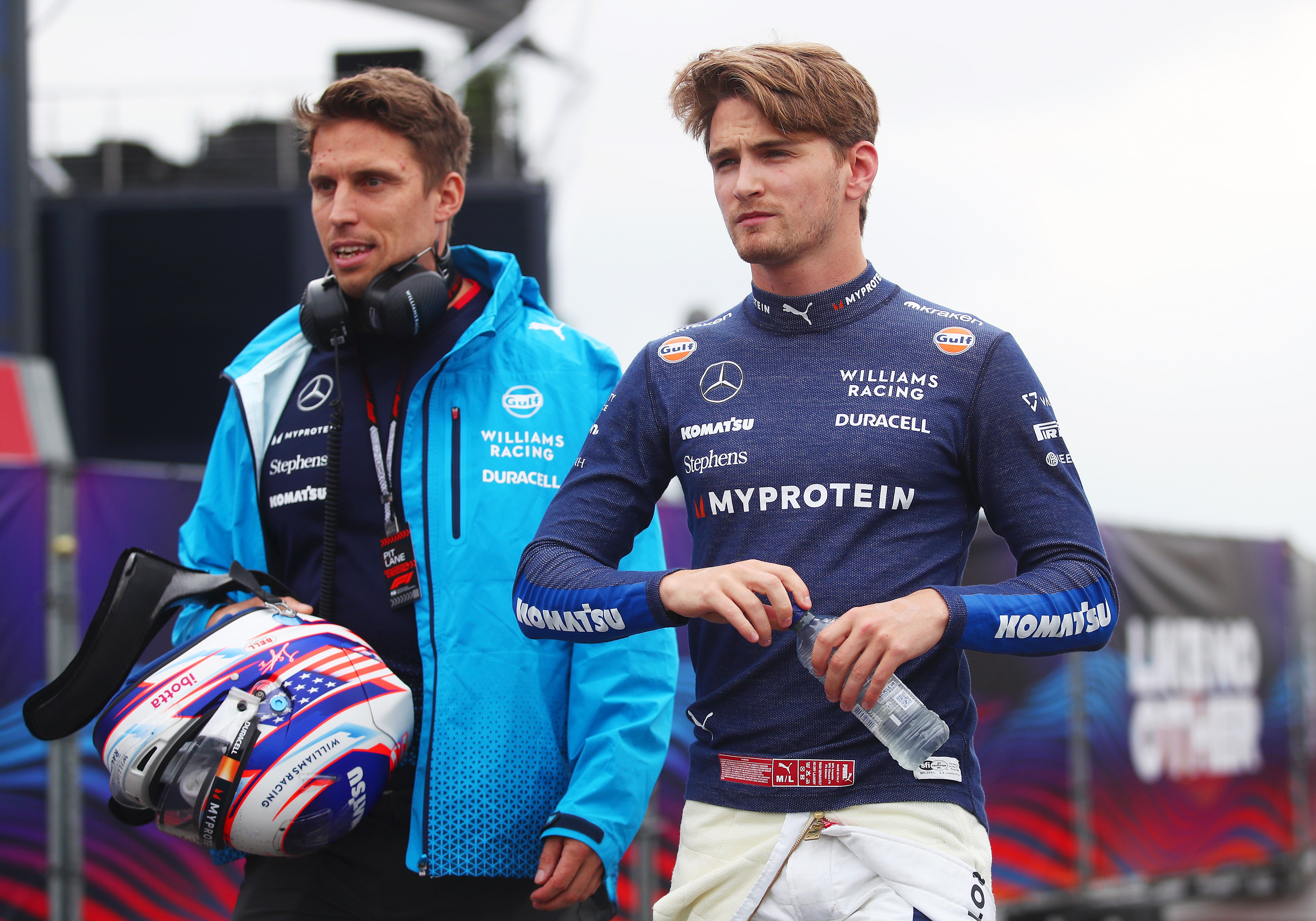 Logan Sargeant of United States and Williams walks in the Paddock after crashing during final practice