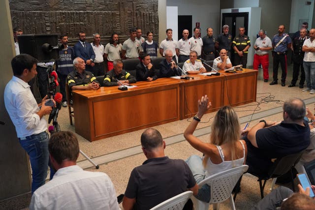 Italian officials were questioned by the media in a press conference on Saturday (Jonathan Brady/PA)