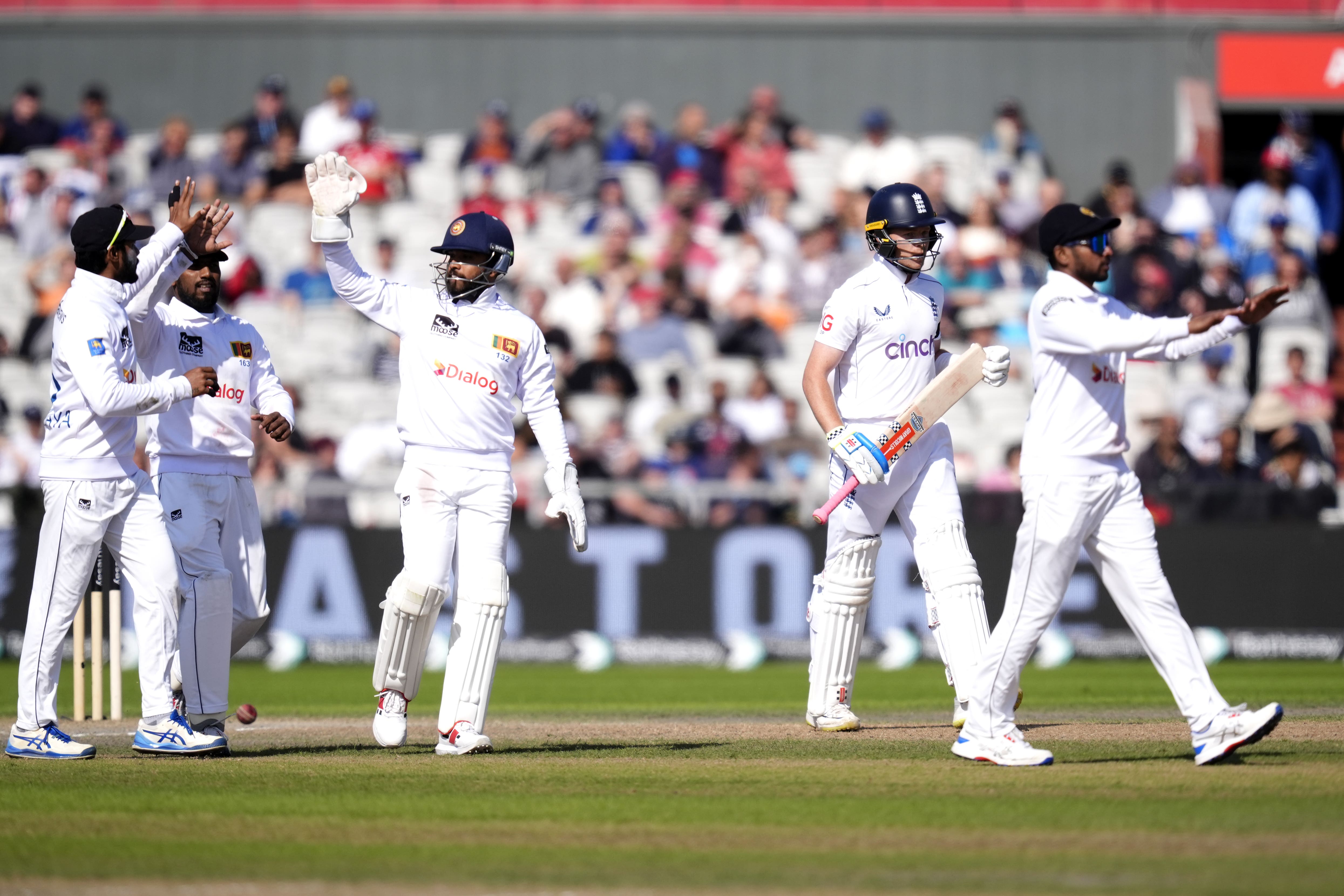 Ollie Pope (second right) fell cheaply for the second time in the match (Nick Potts/PA)