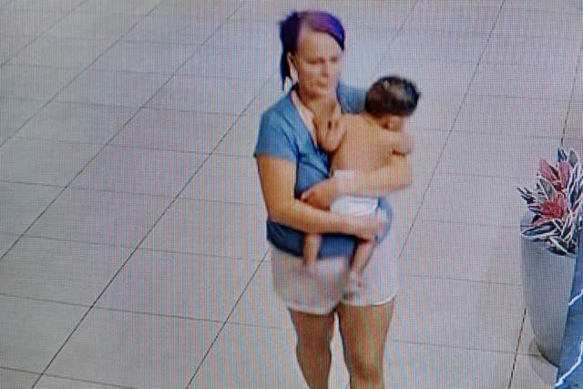 <p>Justyna holding her baby Jay </p>