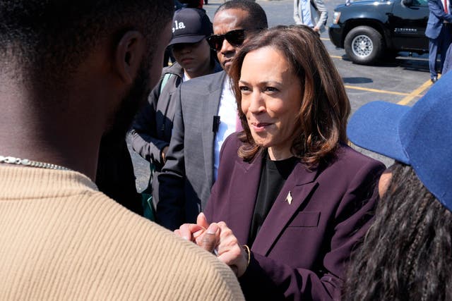 <p>Democratic presidential nominee Vice President Kamala Harris greets supporters before boarding Marine Two at Soldier Field in Chicago, Friday, Aug. 23, 2024, en route to Washington after attending the Democratic National Convention</p>