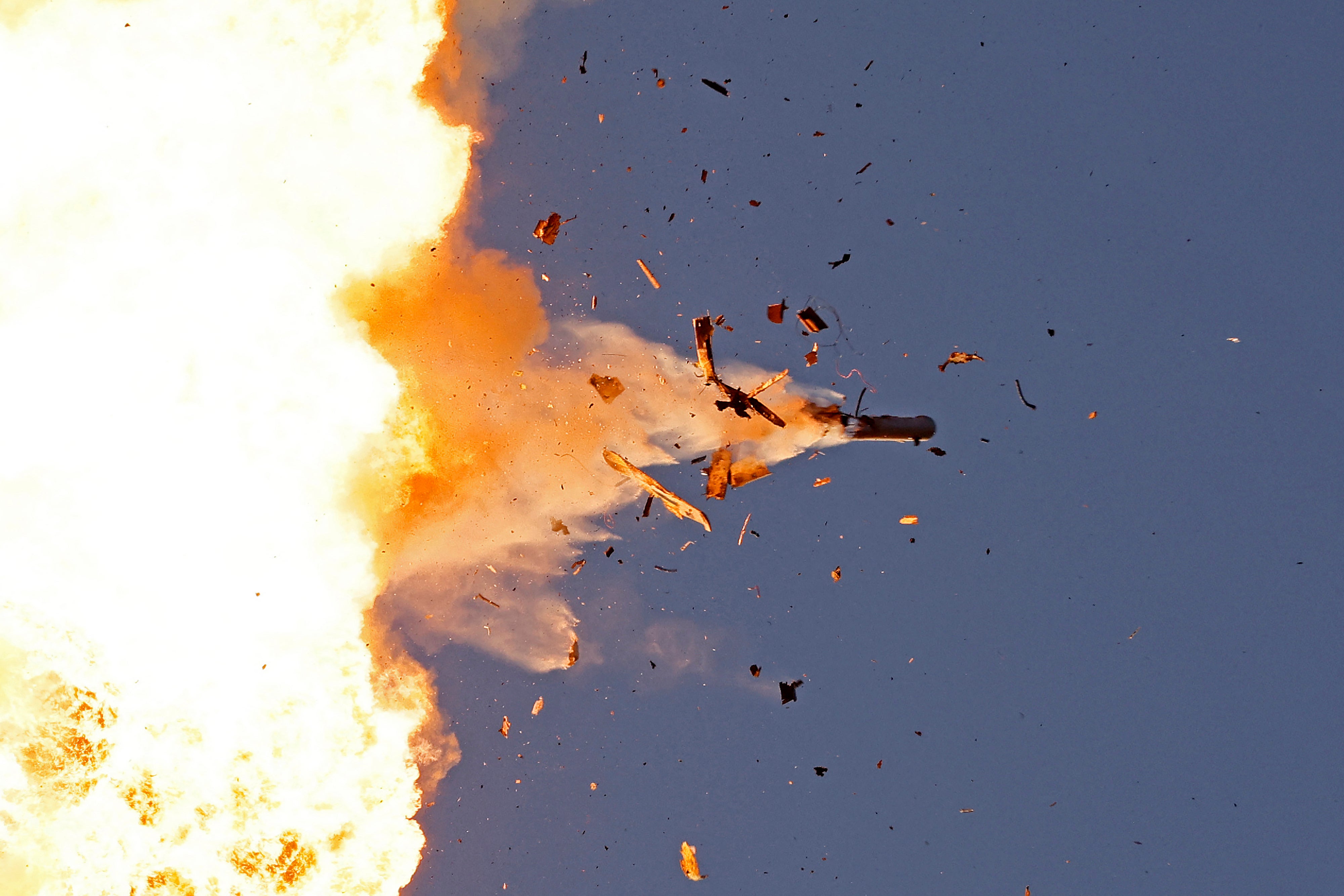 This photo taken from a position in northern Israel shows a Hezbollah UAV intercepted by Israeli air forces over north Israel on 25 August