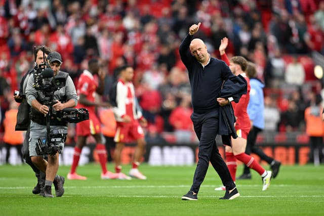 <p>Arne Slot salutes the Anfield crowd after Liverpool’s 2-0 win over Brentford</p>