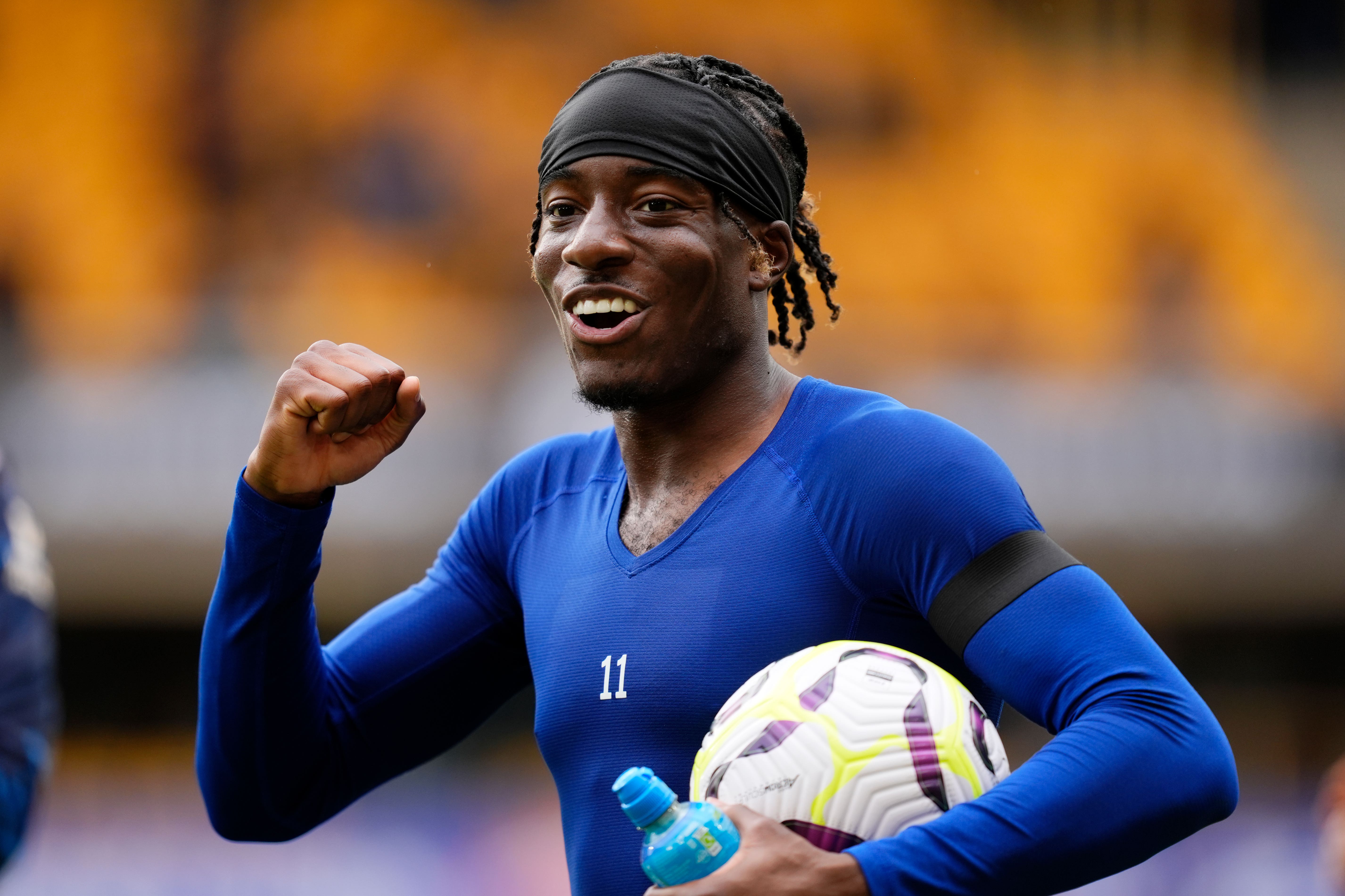 Noni Madueke with the match ball after his hat-trick against Wolves.