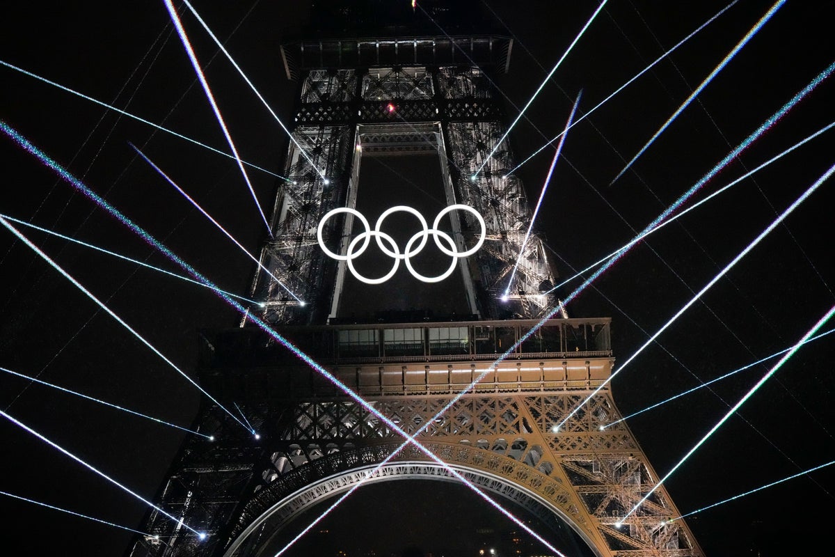 French DJ and LGBTQ+ icon carries Paralympic torch to defy hate she endured over Olympics ceremony