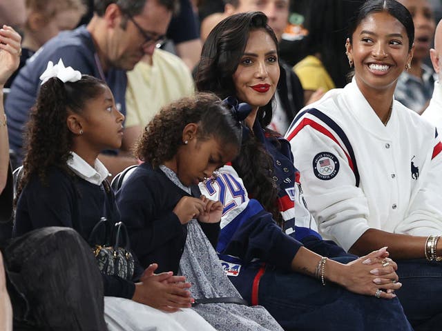 <p>Bianka Bryant (left) took the ceremonial throw in LA accompanied by younger sister Capri, mother Vanessa and older sister Natalia </p>