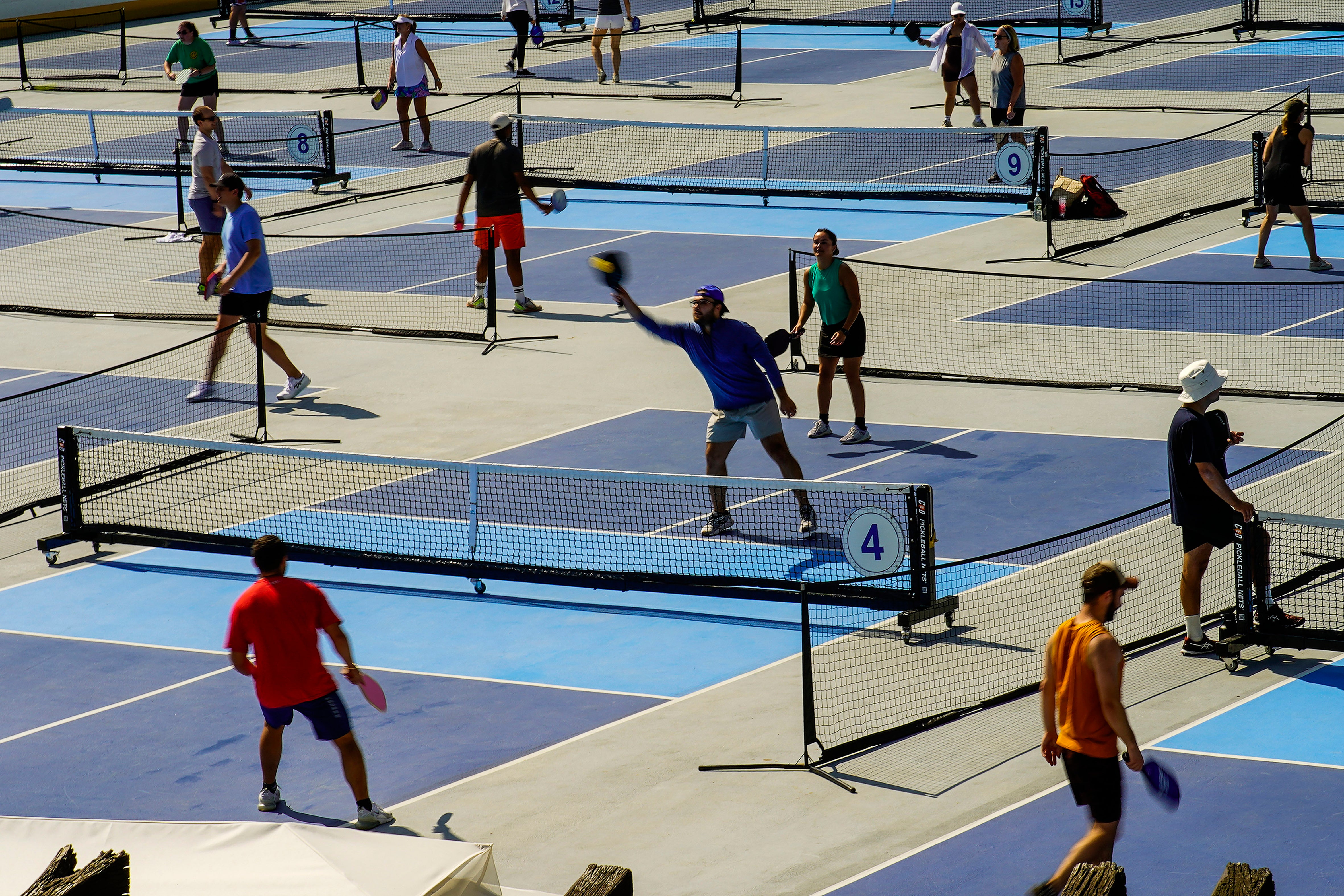 People practice pickleball on the courts of CityPickle at Central Park’s Wollman Rink, Saturday, Aug. 24, 2024