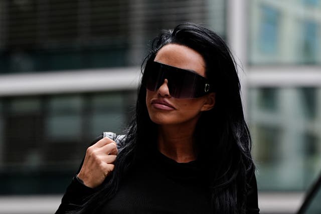 <p>Katie Price arriving at the Rolls Building, London, to face questions over her finances at a public examination in court on Tuesday </p>