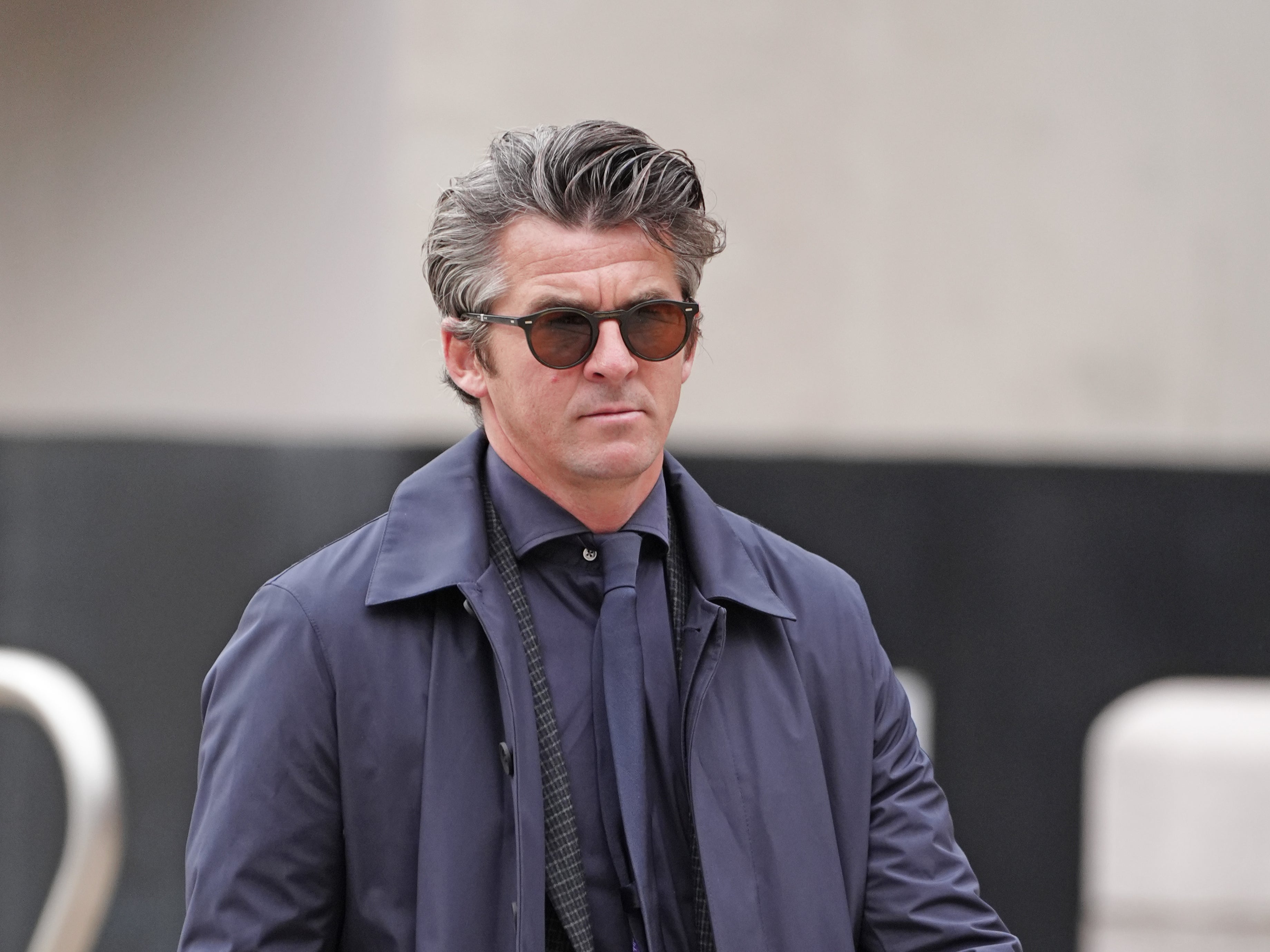 Joey Barton arrives at Liverpool Crown Court to face malicious communications charge on Tuesday