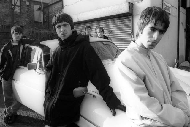 <p>Manc motor mouths: Oasis (from left, Paul McGuigan, Noel Gallagher, Tony McCarroll, Paul ‘Bonehead’ Arthurs and Liam Gallagher) commandeer a Jaguar XJ6 for a November 1993 shoot</p>