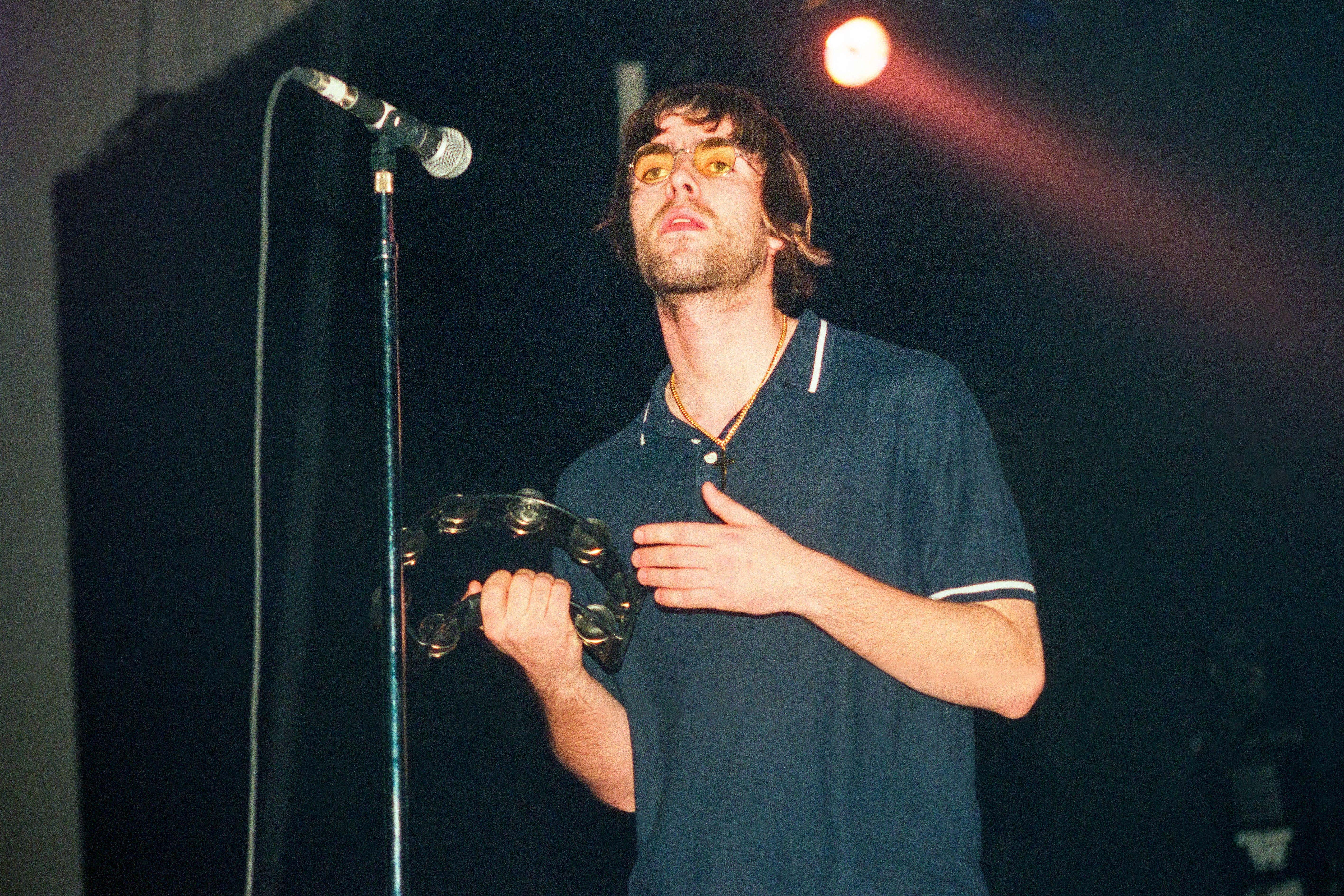 Liam’s polo and round glasses became the teenage boy uniform of the Nineties (Alamy/PA)