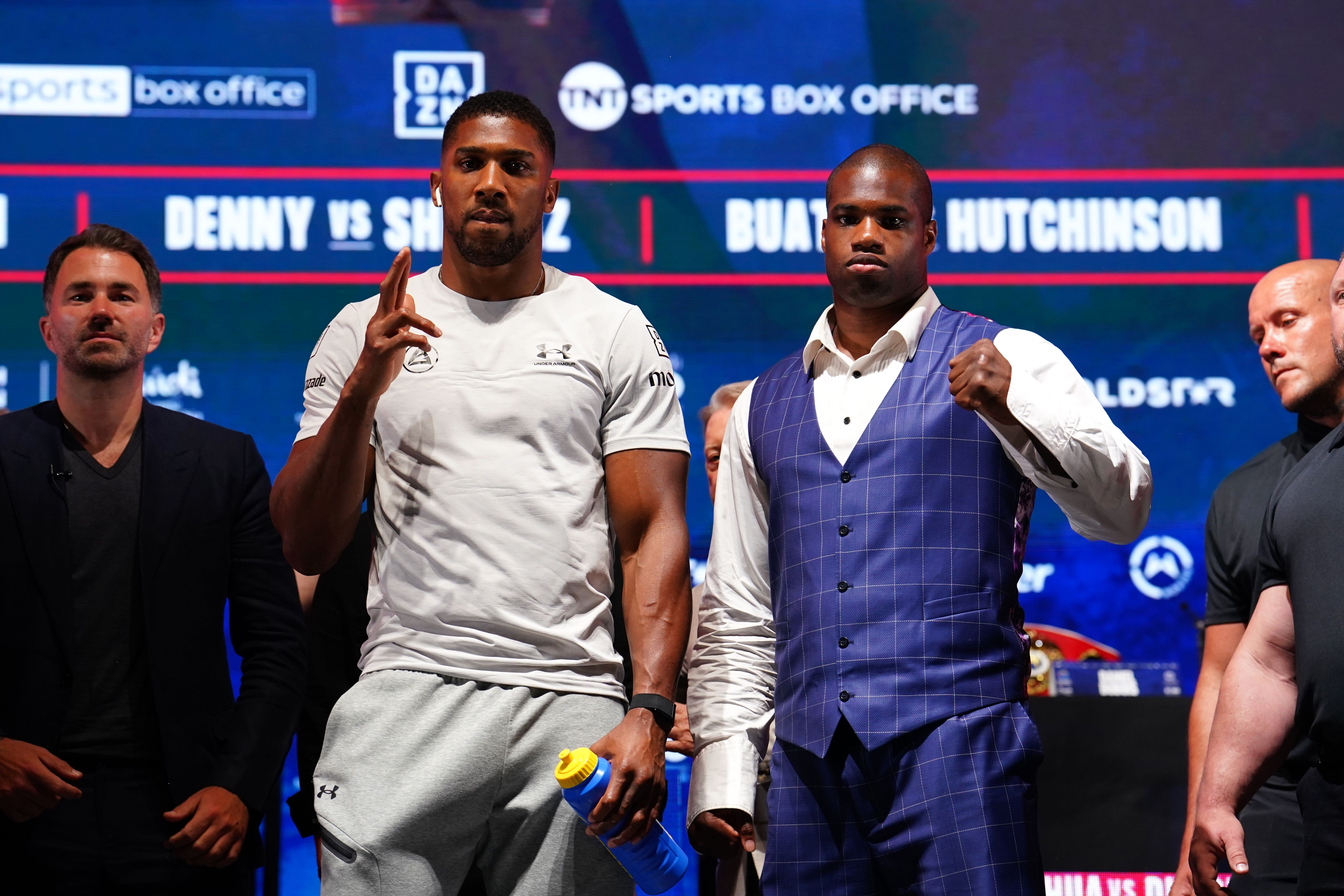 Anthony Joshua (centre-left) and Daniel Dubois are set to clash in September