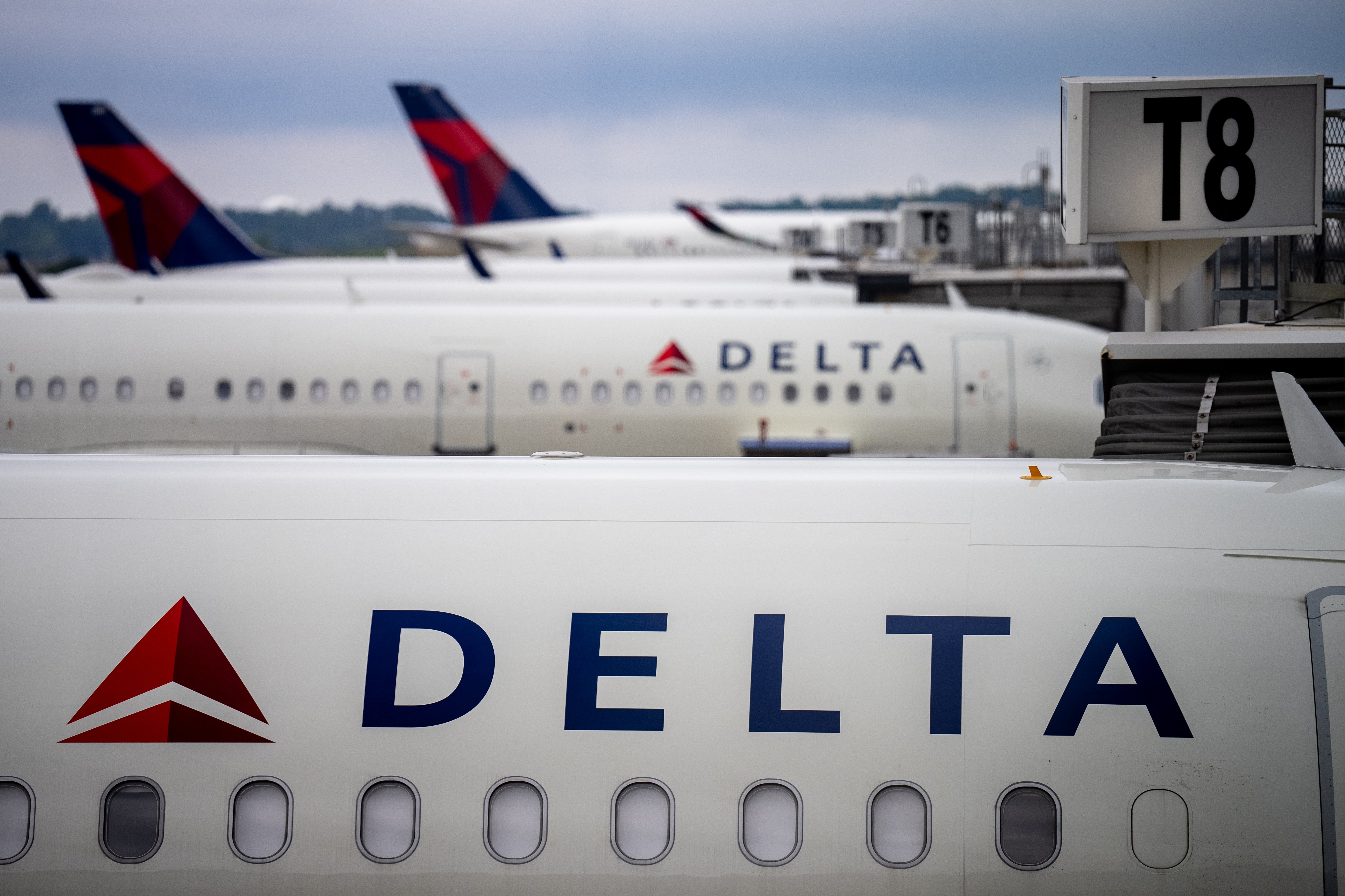 Delta planes parked at Hartsfield-Jackson Atlanta International Airport. A tire on a Delta plane burst in a maintenance area of ​​the airport, killing two airline employees and injuring a third.