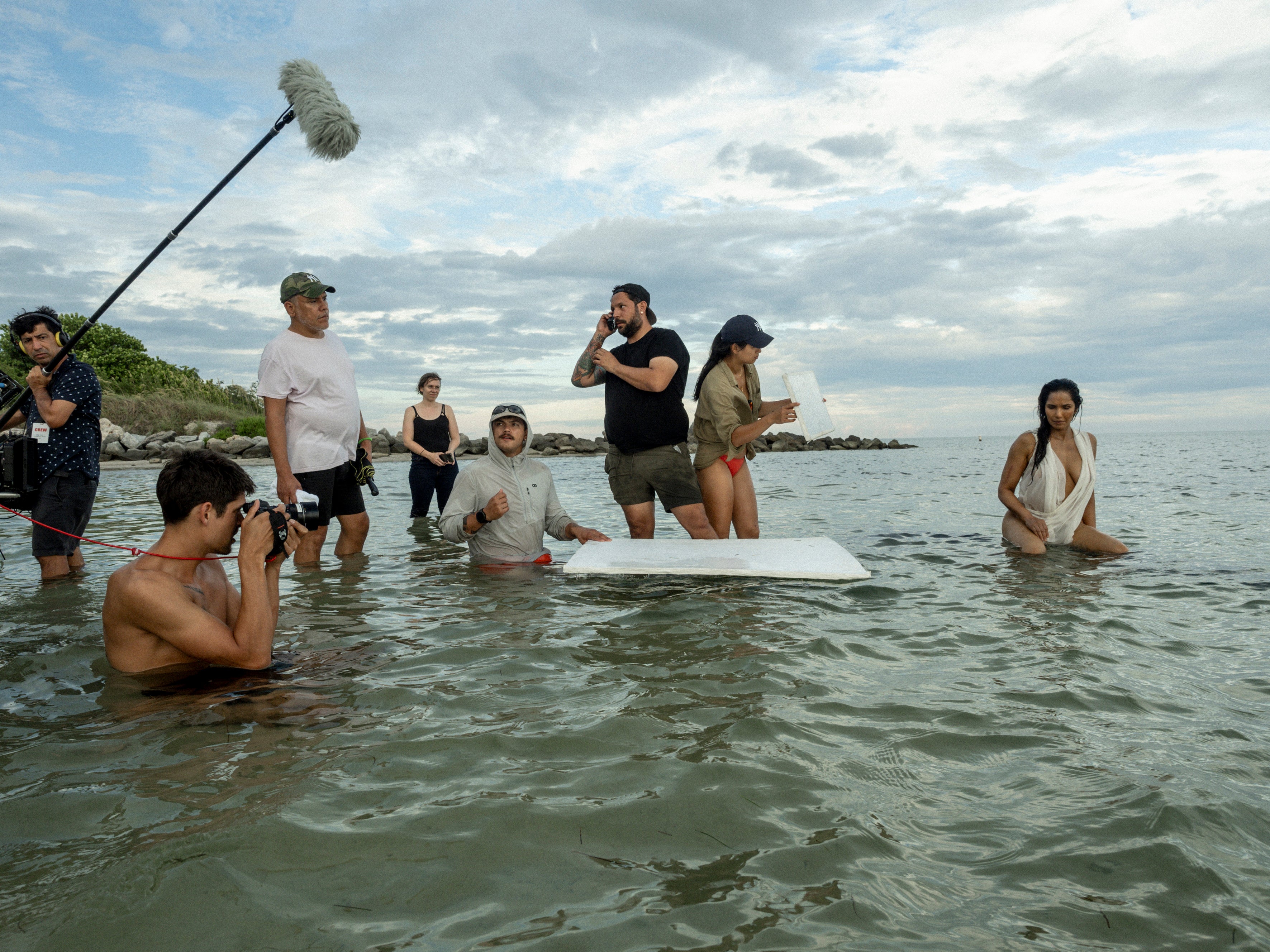 Padma Lakshmi sits in the water for her outdoor Pirelli Calendar 2024 photoshoot