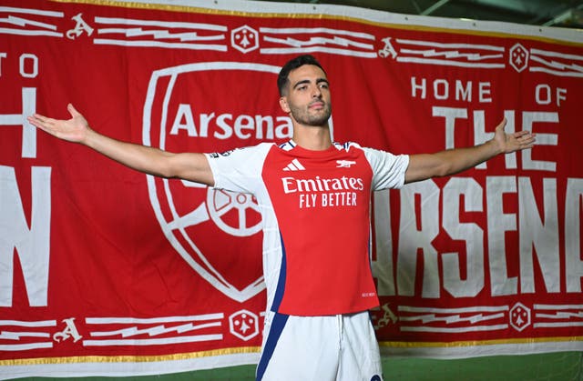 <p>Mikel Merino poses at Arsenal’s traning ground after signing for the club</p>