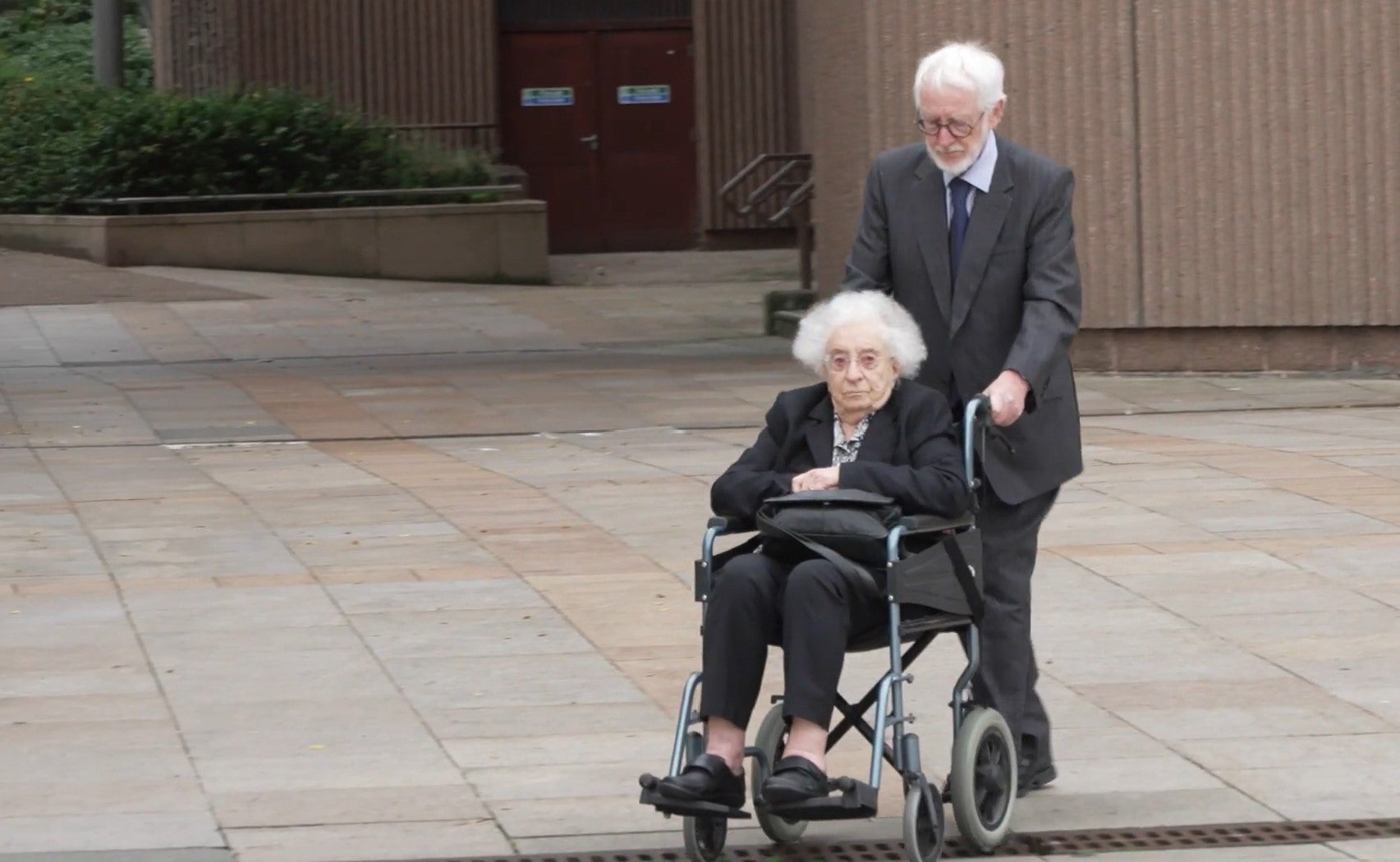 June Mills arriving Liverpool Crown Court where she has pleaded guilty to causing death by dangerous driving after her car mounted a pavement and hit two pedestrians