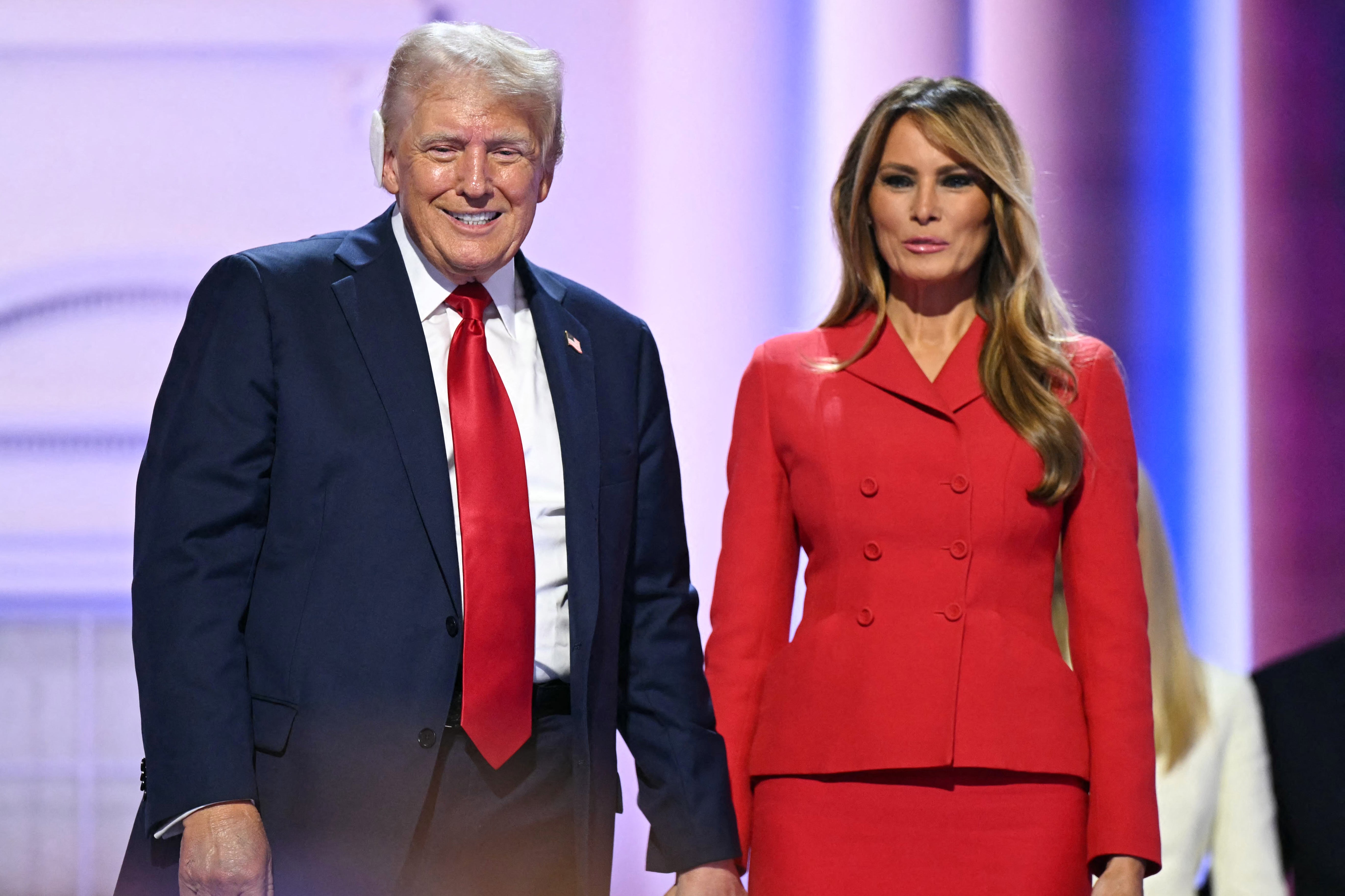 Donald Trump with Melania Trump on stage after he accepted his party's nomination on the last day of the Republican National Convention on July 18 2024